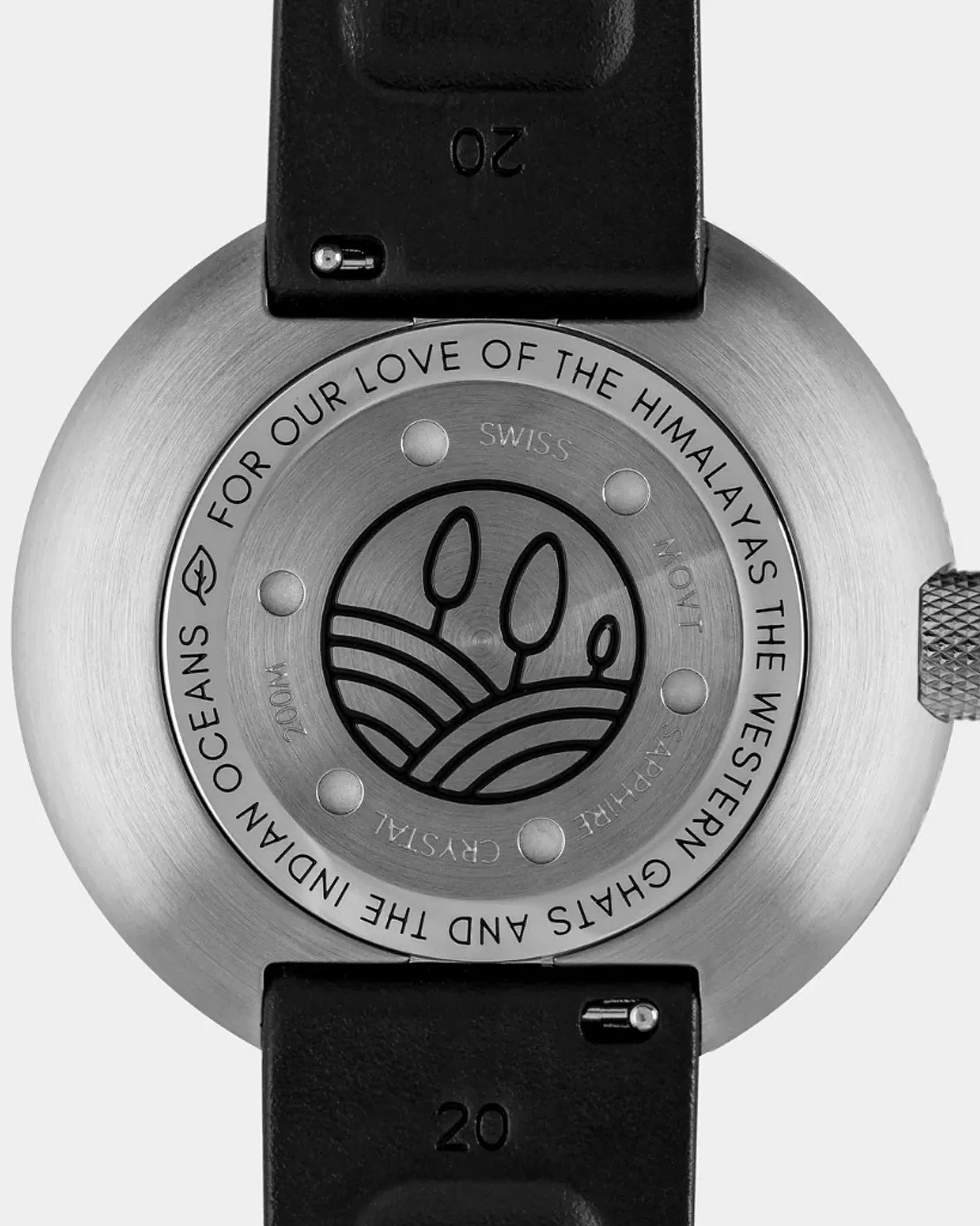 engraved case back of a Bangalore Watch Co. field watch