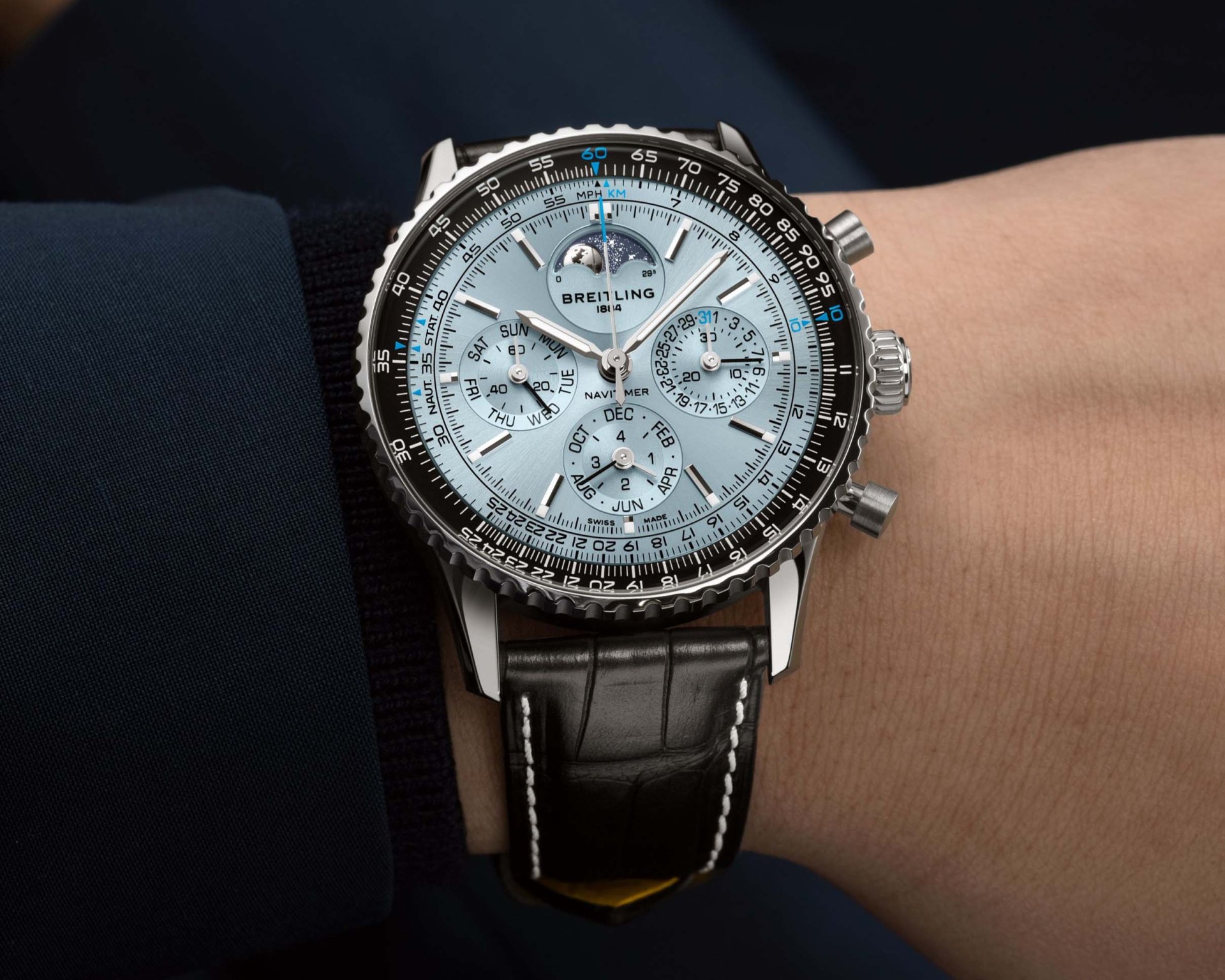 a breitling chronograph watch on a man's wrist
