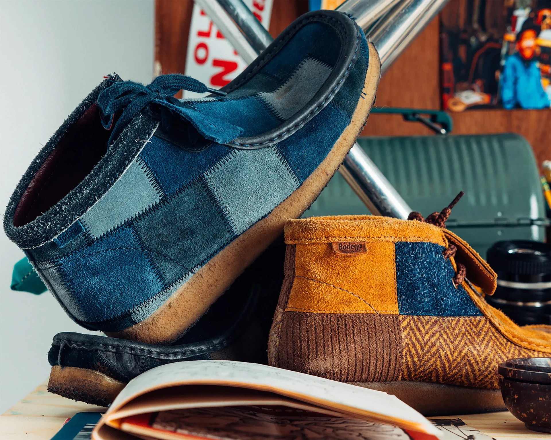 two different pairs of patchwork clarks wallabee boots