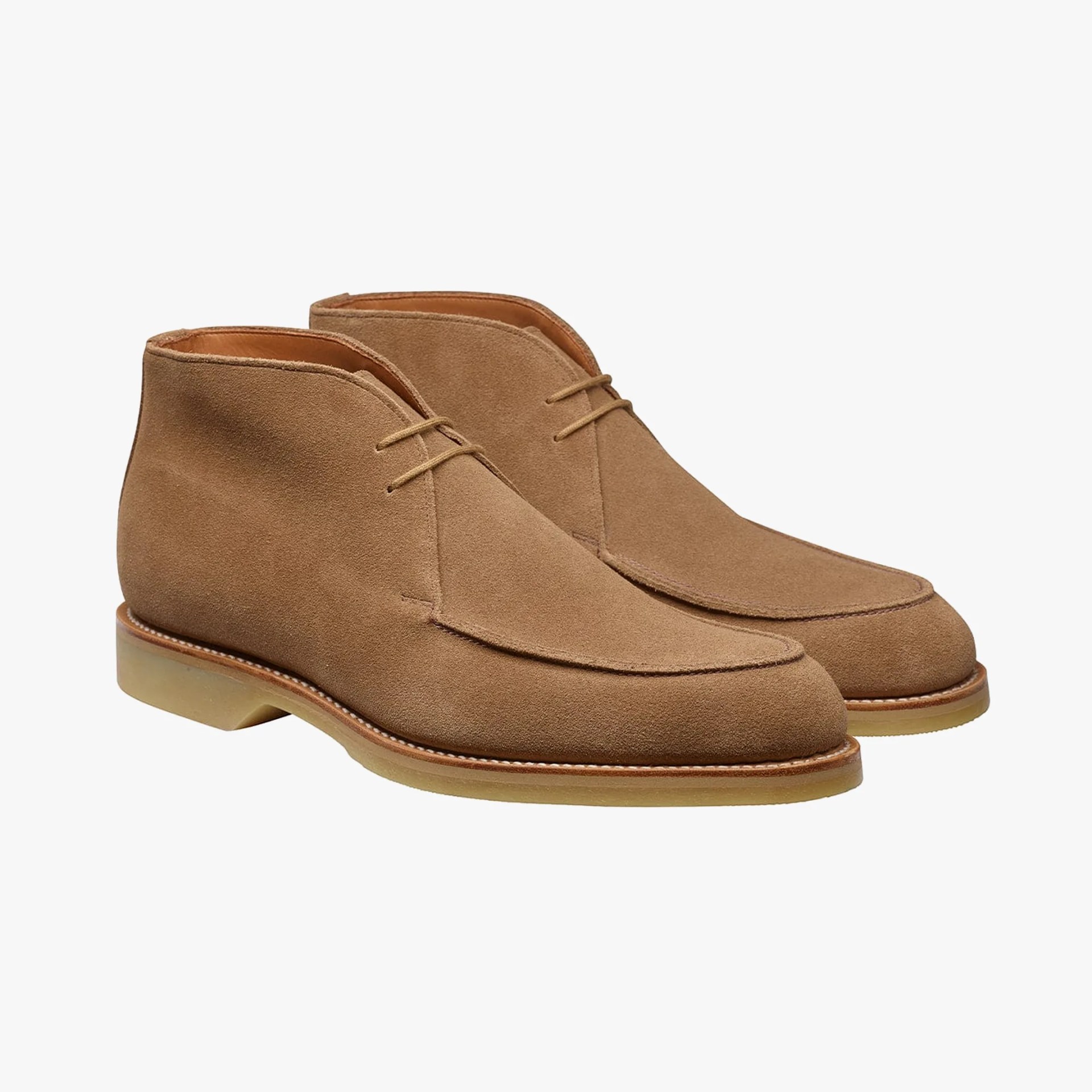 a pair of tan suede desert boots