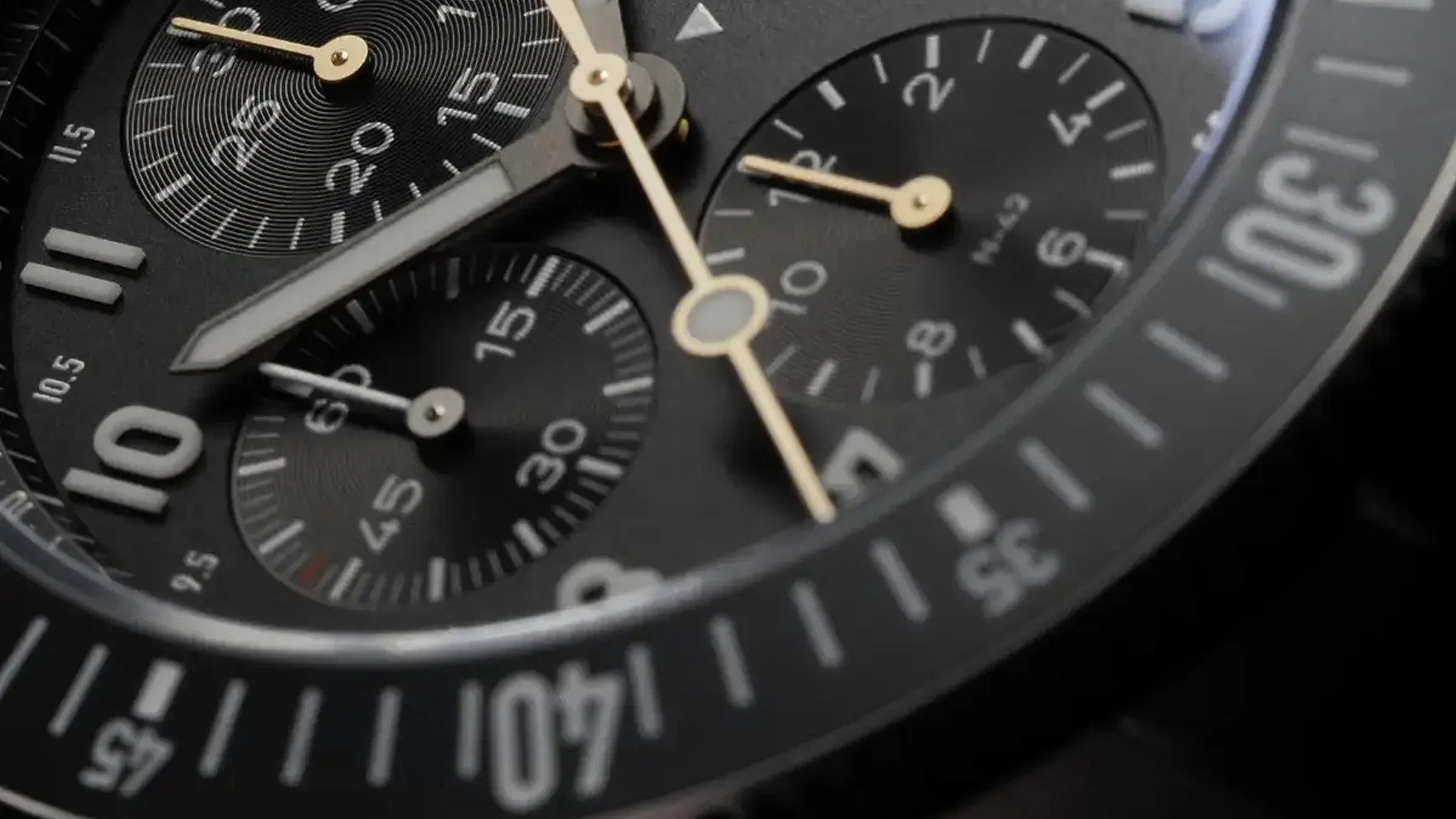 a black Fortis chronograph watch dial