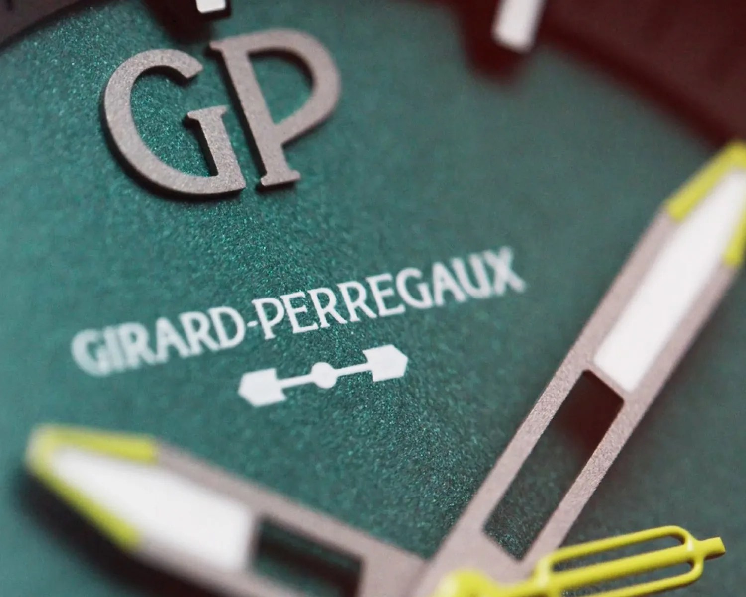 a closeup of a girard perregaux dial