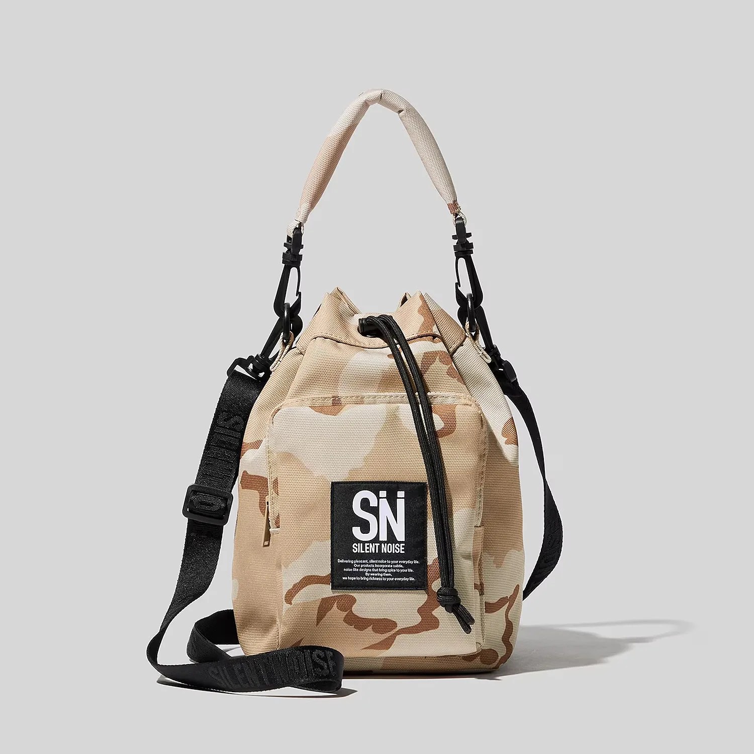a tan camo Silent Noise bag from Uniqlo