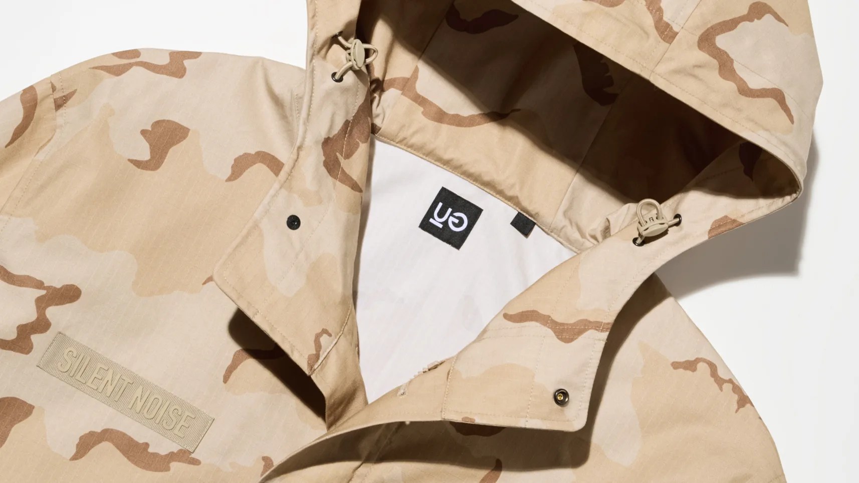 a tan camo hooded jacket from UG by Uniclo