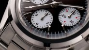 close up of the dial on a steel chronograph watch