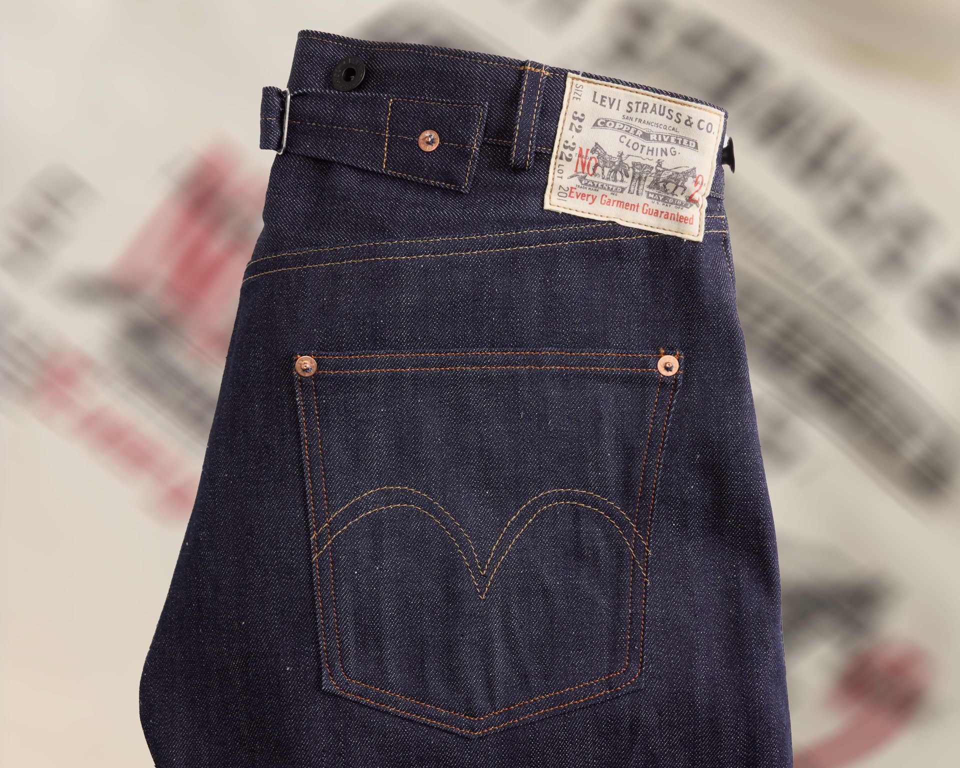 the back pocket of a pair of vintage levi's replica jeans