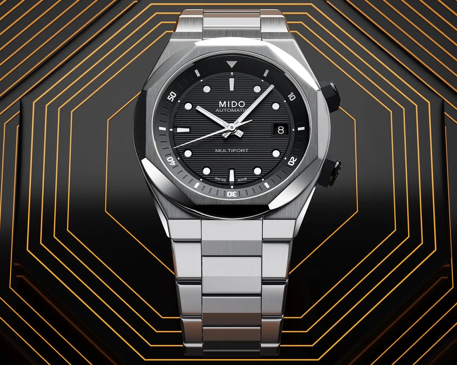 a steel dive watch with a black dial and steel bracelet