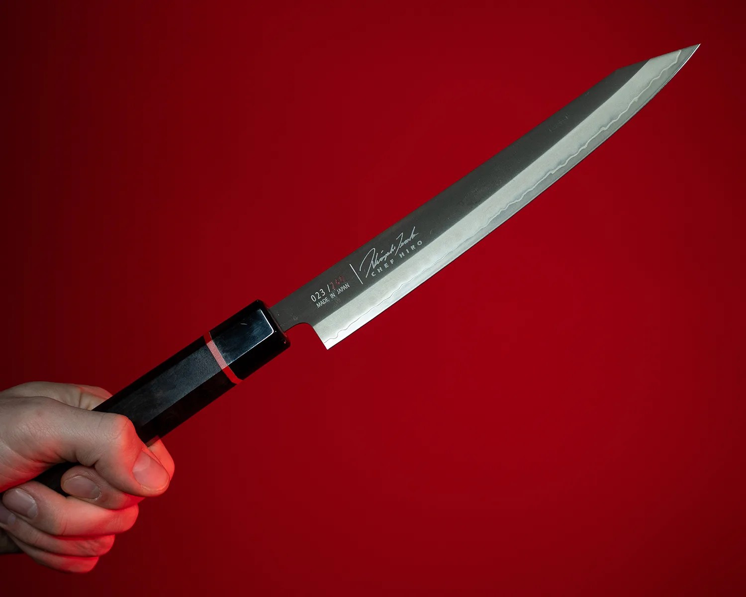 nissan z nismo precision sushi knife in hand