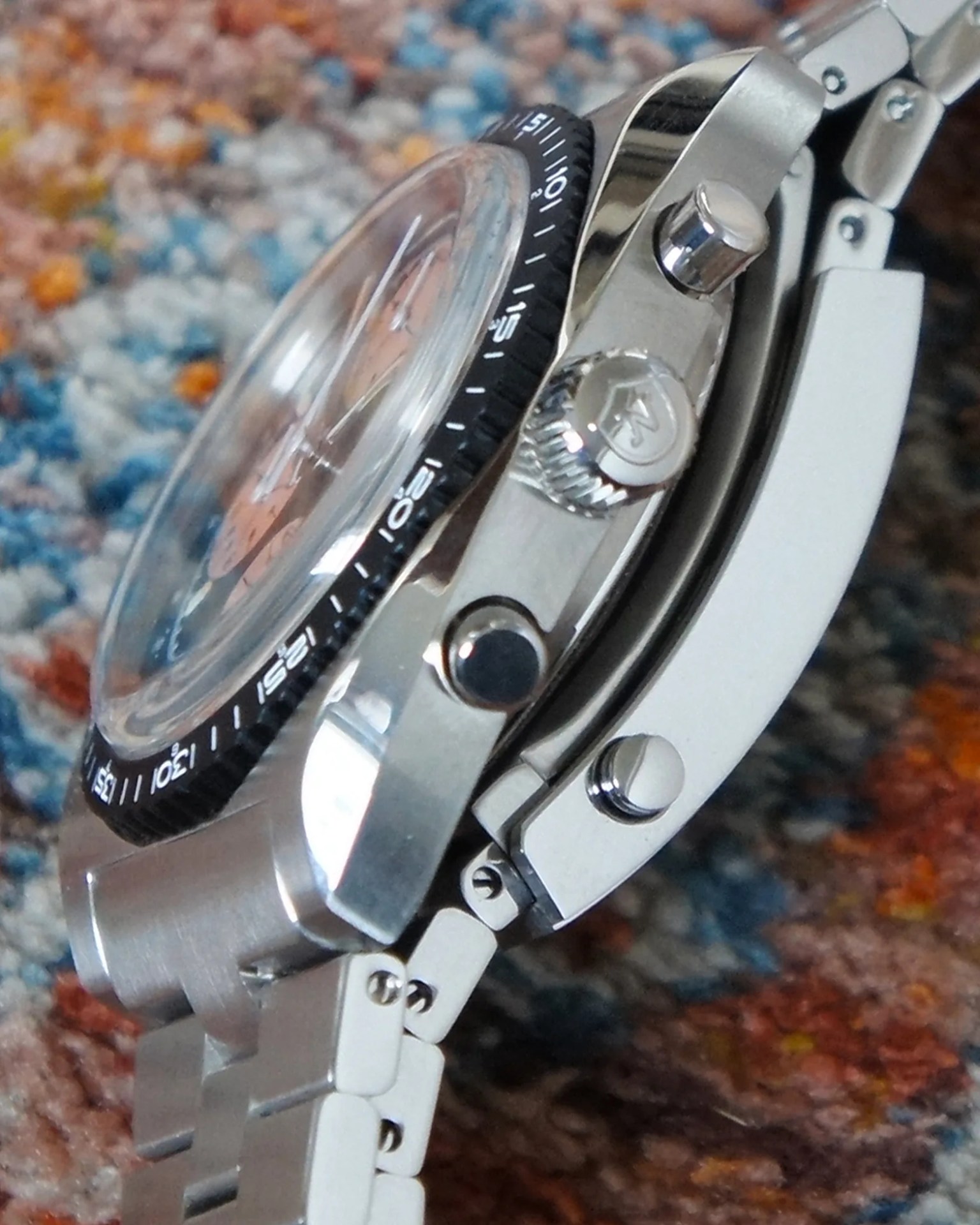 the crown and pushers on a Nivada Grenchen chronograph watch