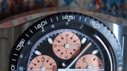 the bezel and dial of a chronograph watch