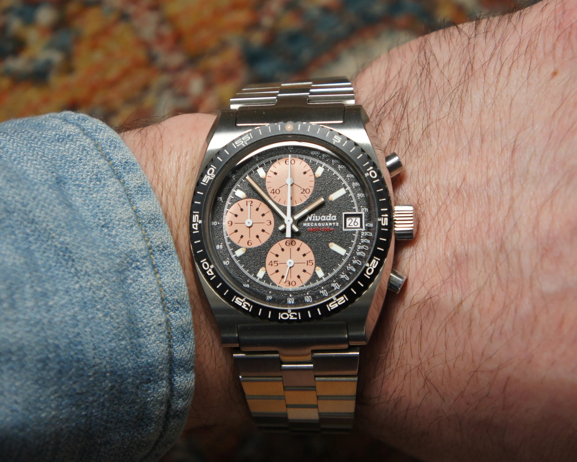 a chronograph watch on a man's wrist