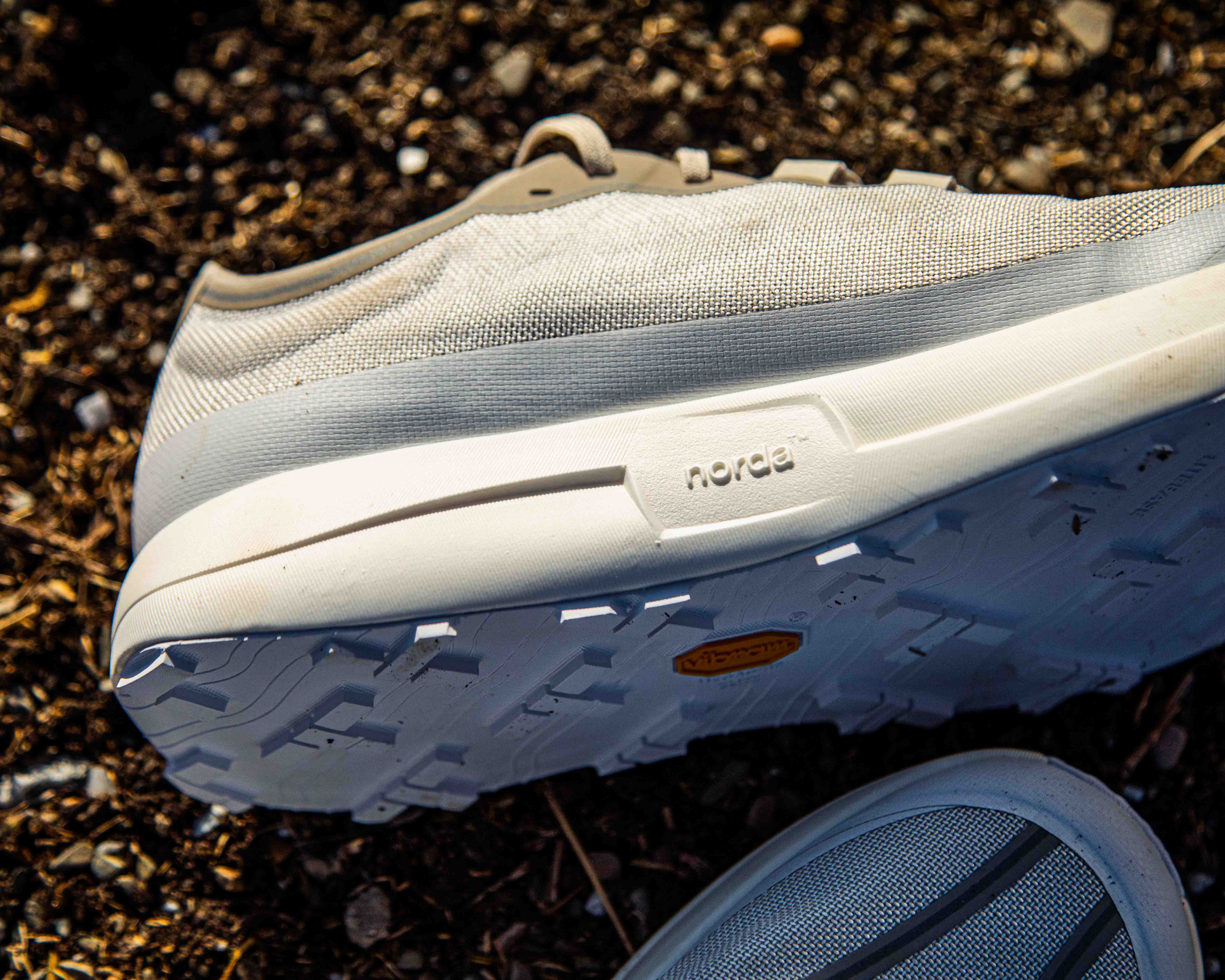 pair of norda 005 shoes on a dirt surface