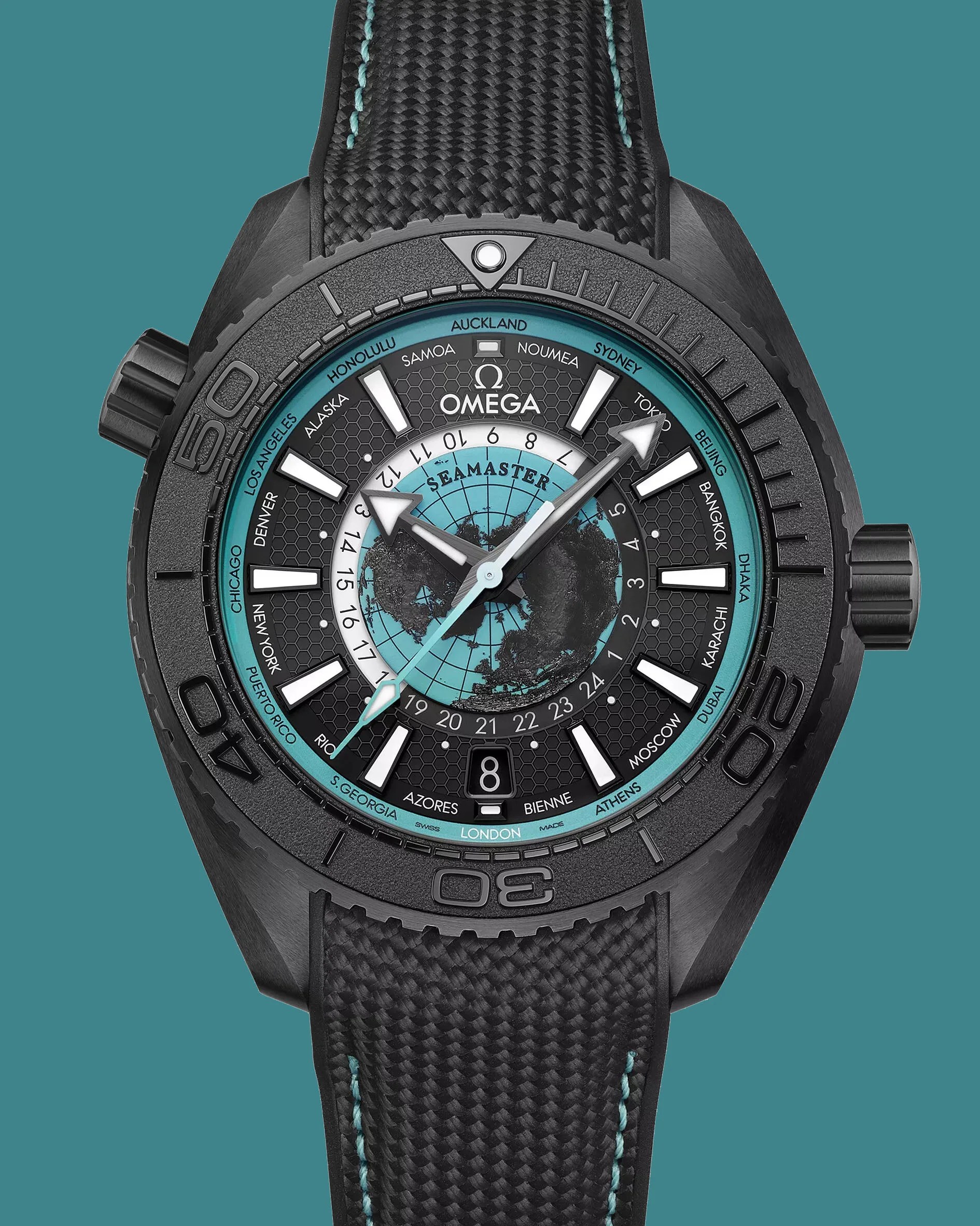 a black Omega Seamaster dive watch with a blue and black dial