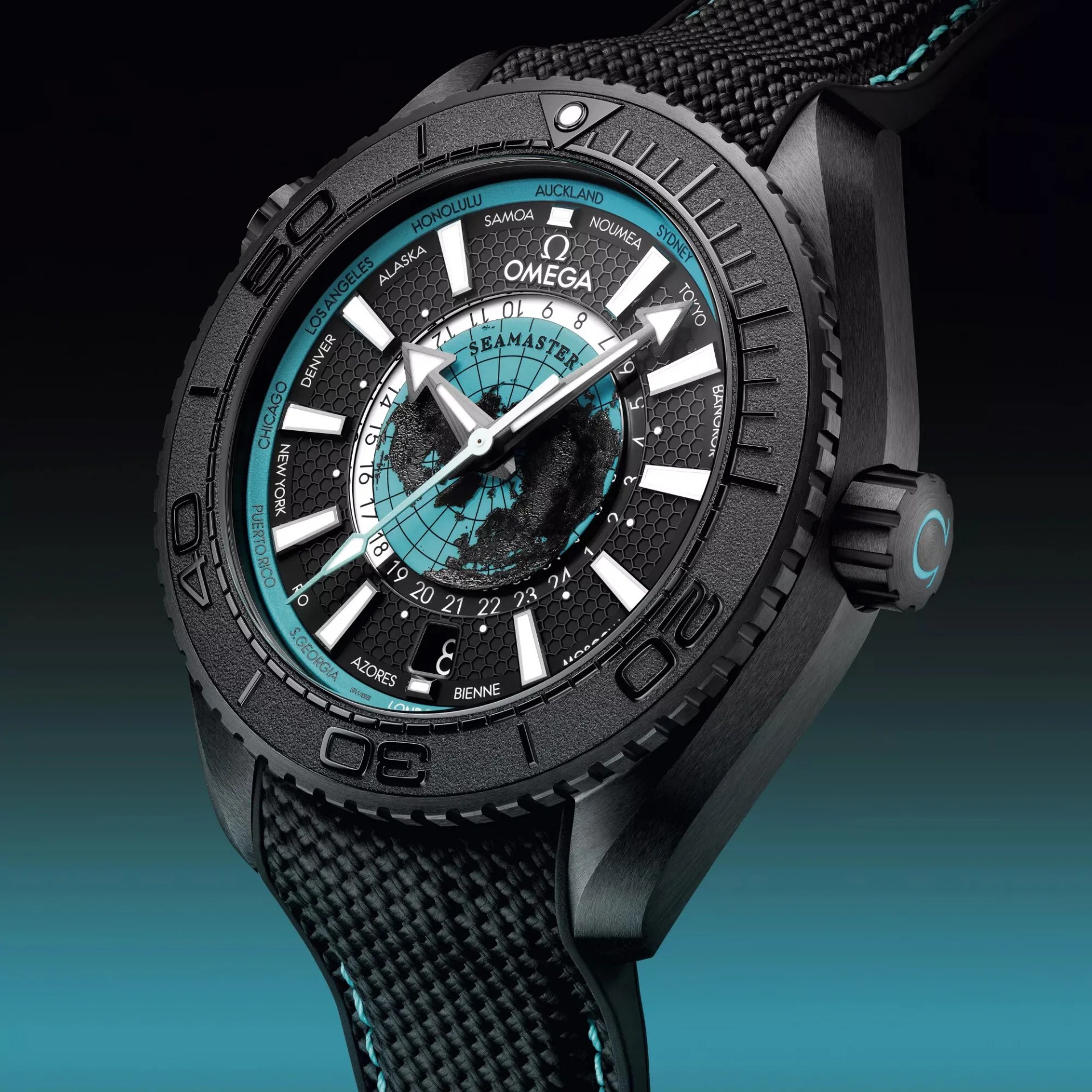 a black Omega dive watch with a blue and black dial