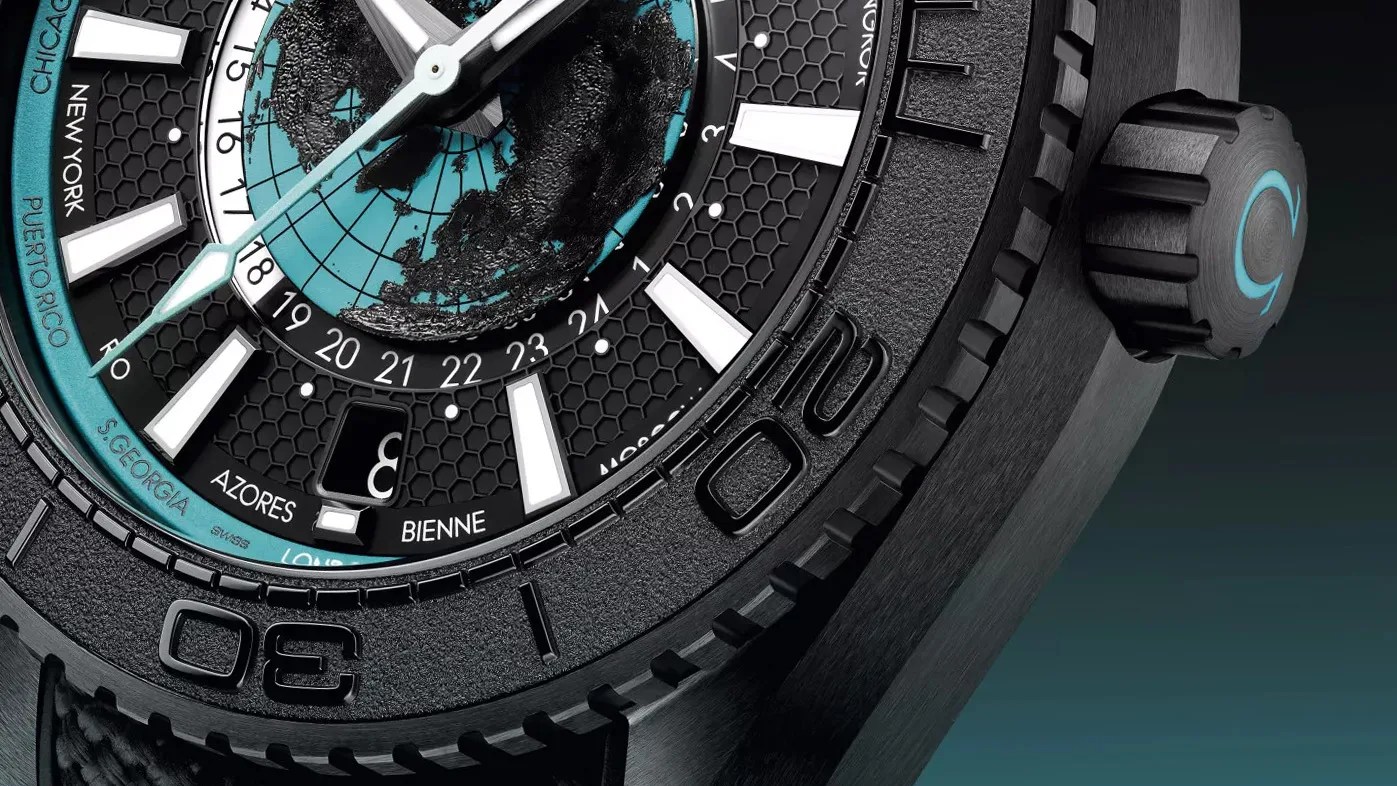 the dial, crown and bezel of an Omega Planet Ocean dive watch