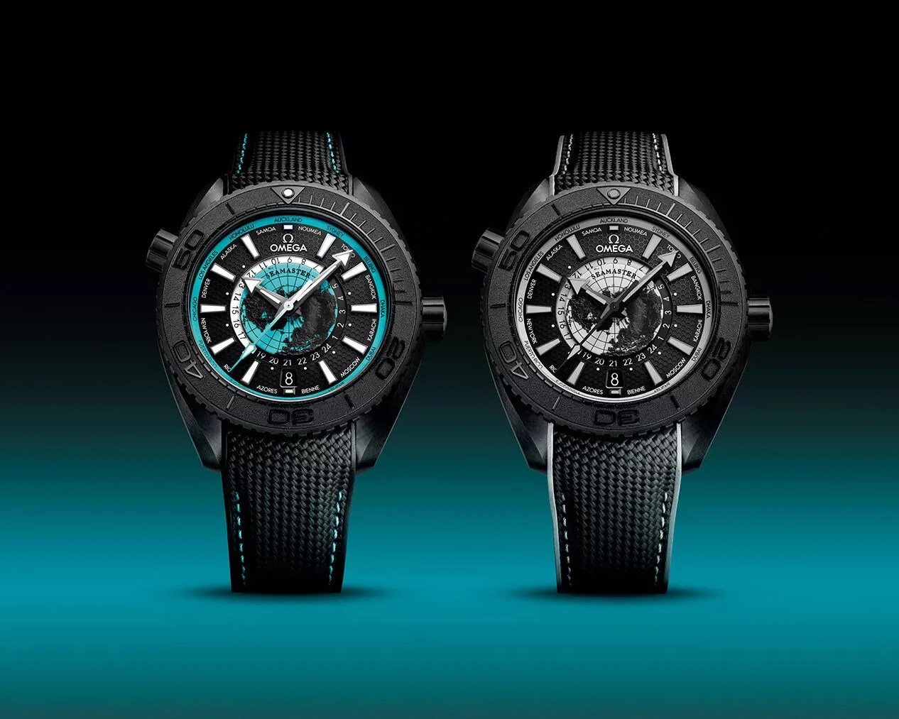 two black dive watches on a blue and black background