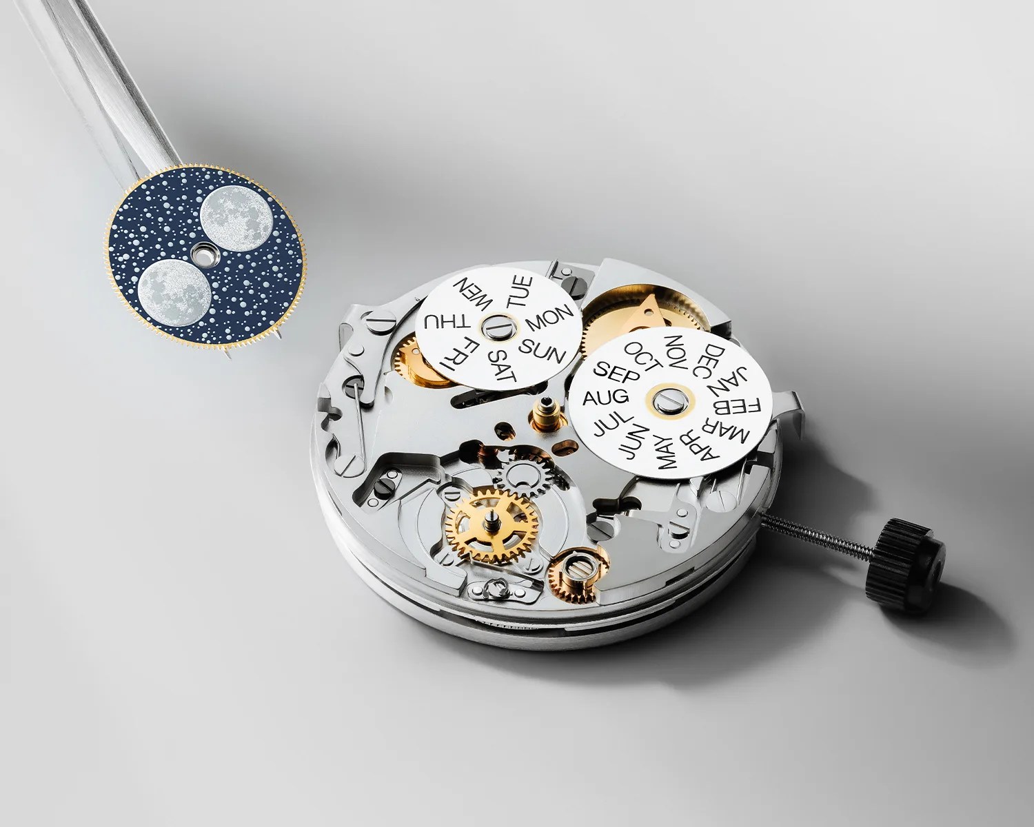a raymond weil watch movement being assembled