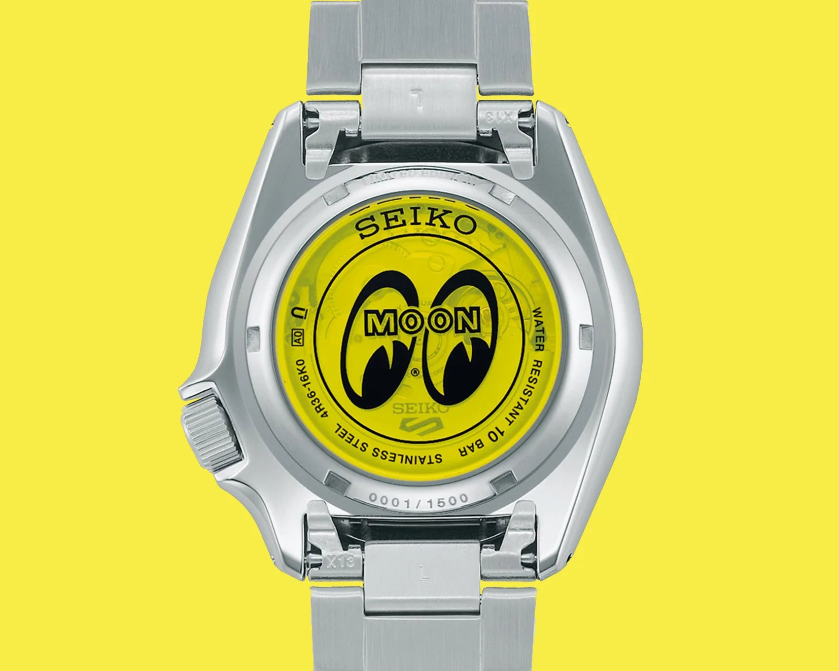 the yellow exhibition case back of a Seiko watch