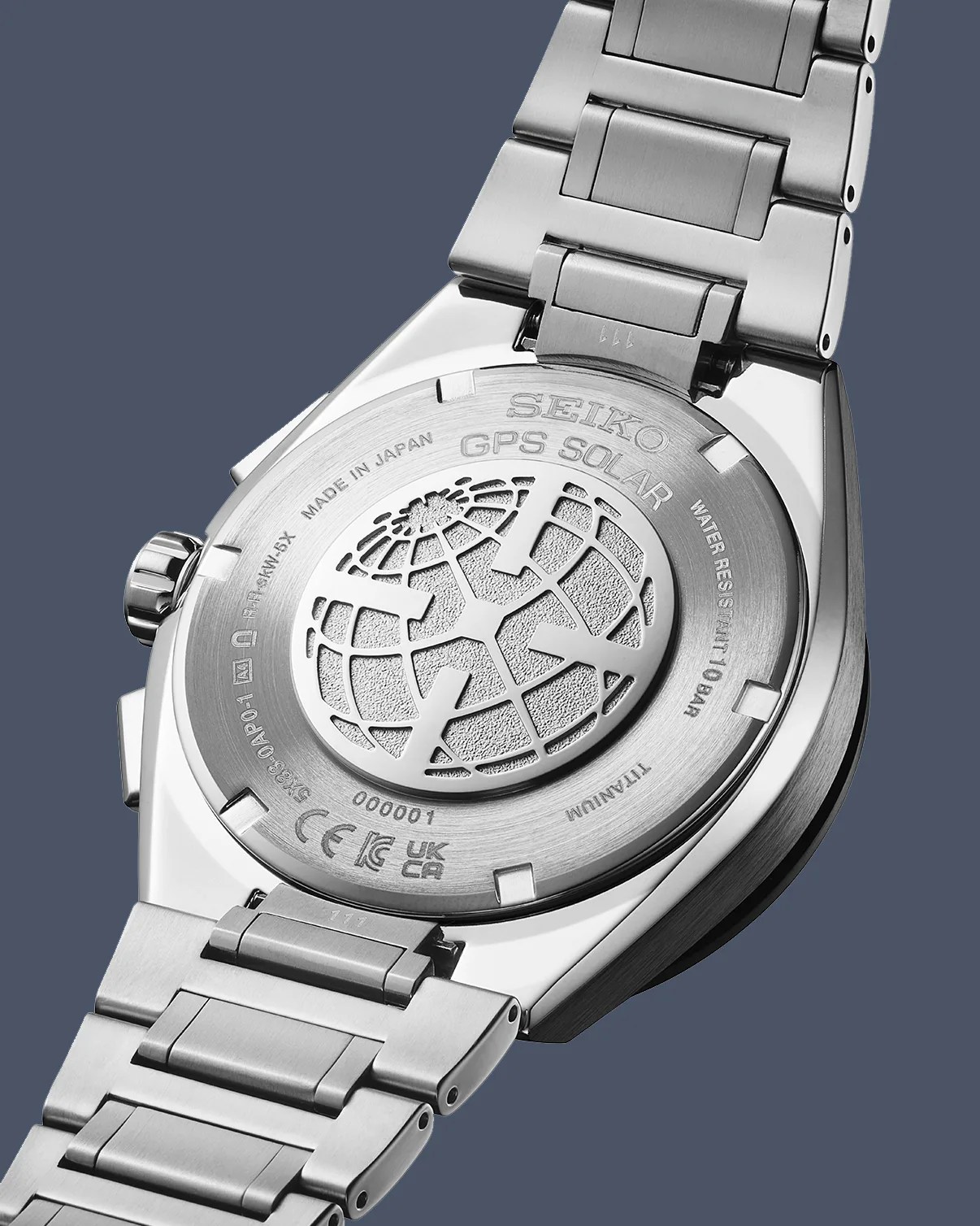 the steel case back of a Seiko Astron watch