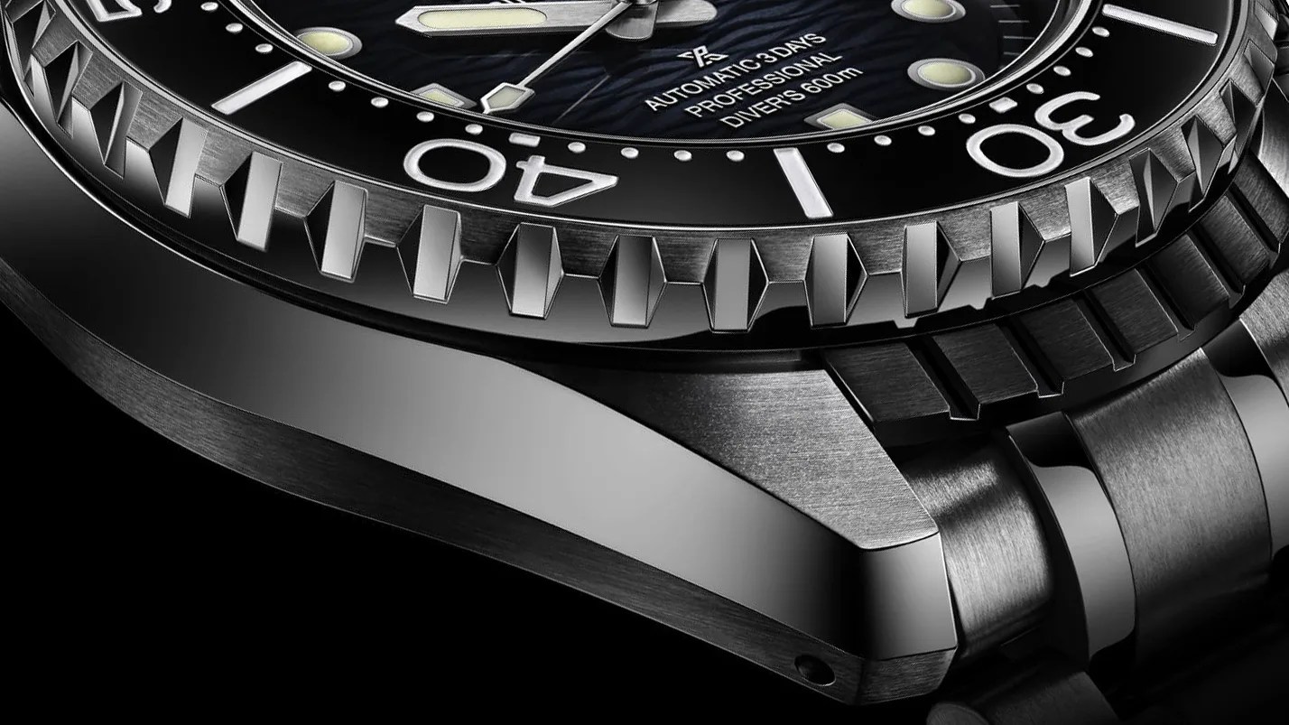 the case and bezel of a steel dive watch