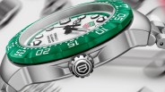 a green and white TAG Heuer watch