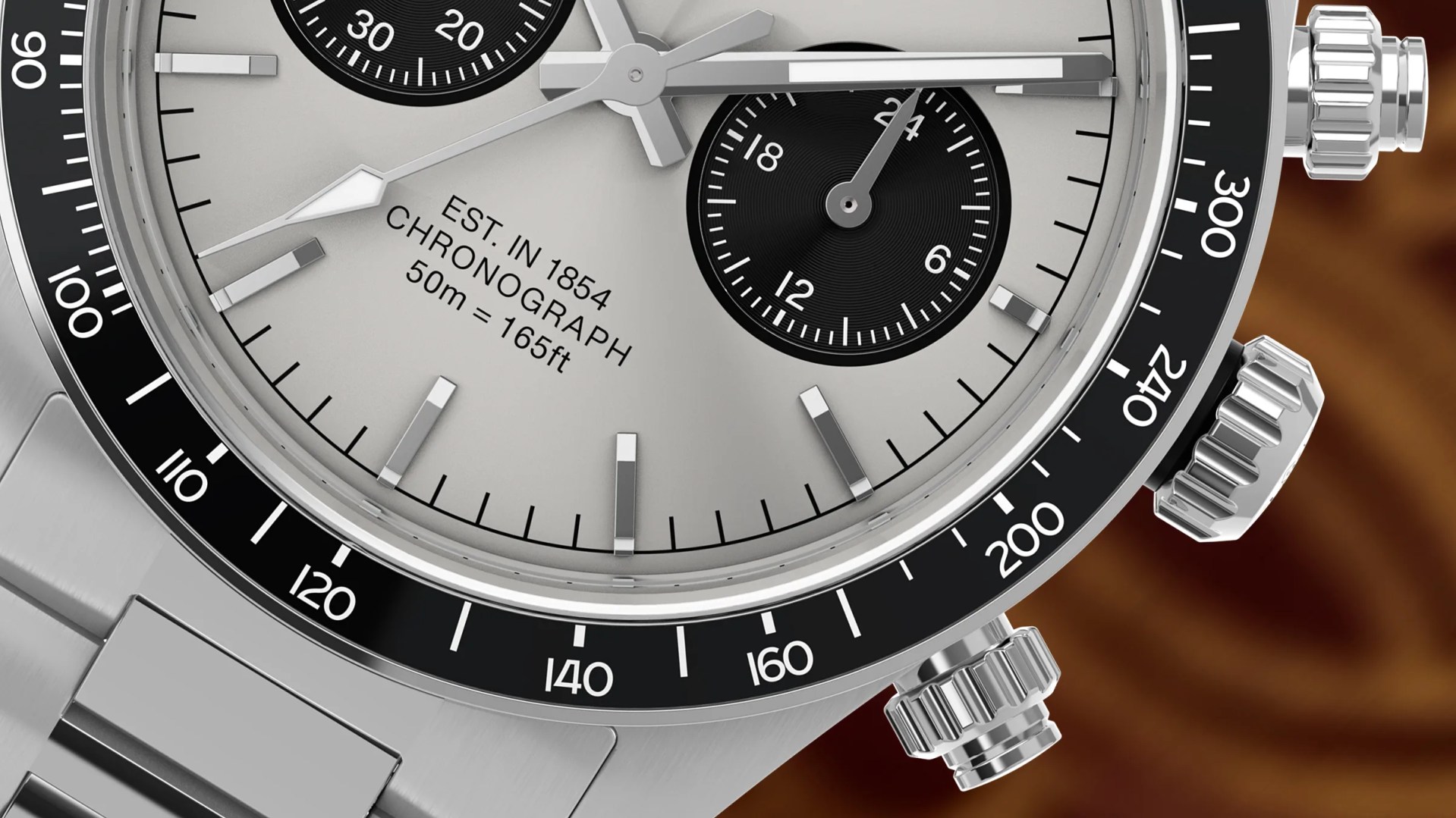 the dial, bezel and crown of a Timex chronograph watch