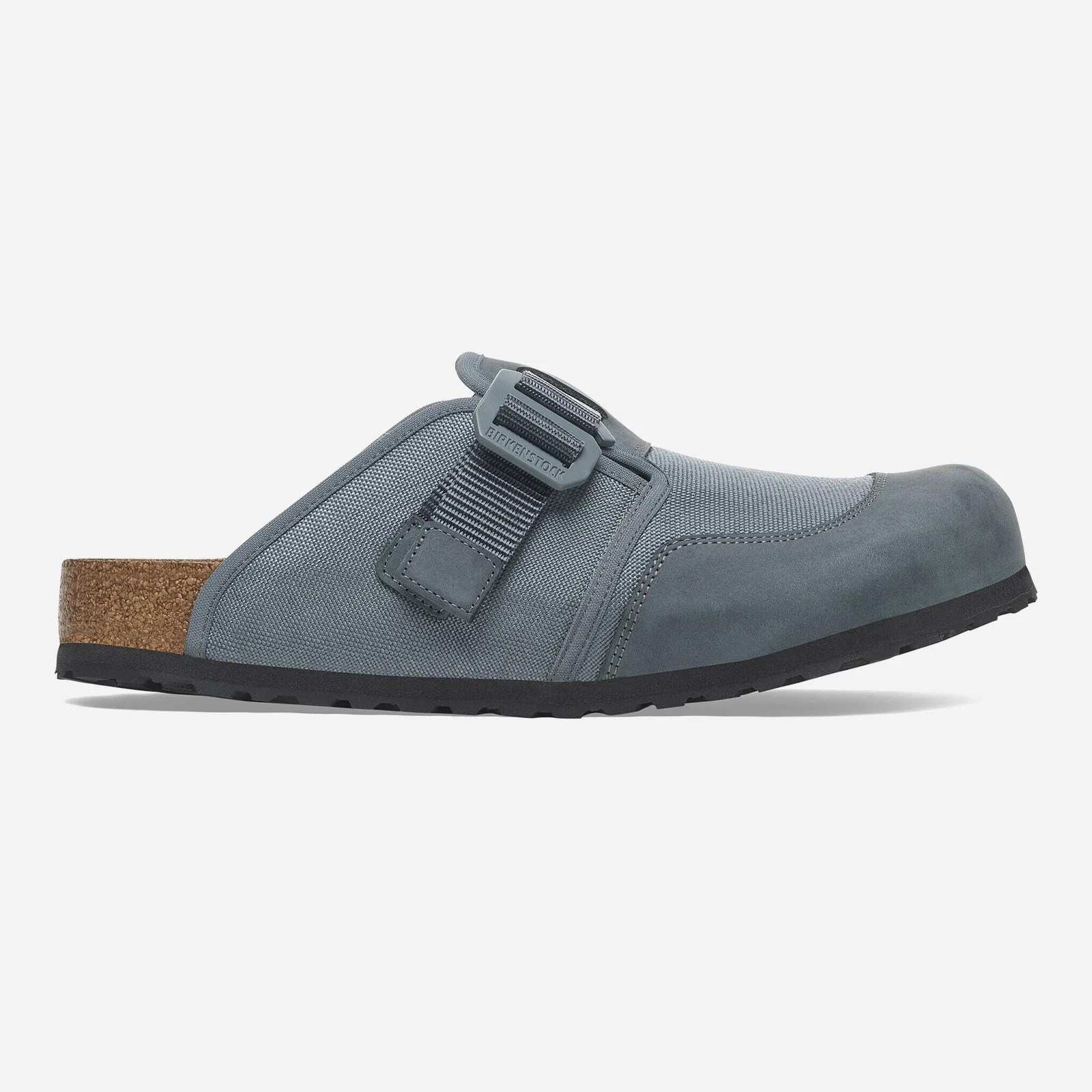 A single left Birkenstock Boston Nova sandal in greyish blue shown in profile with the toe pointing to the right hand side of the image against a light grey background. 