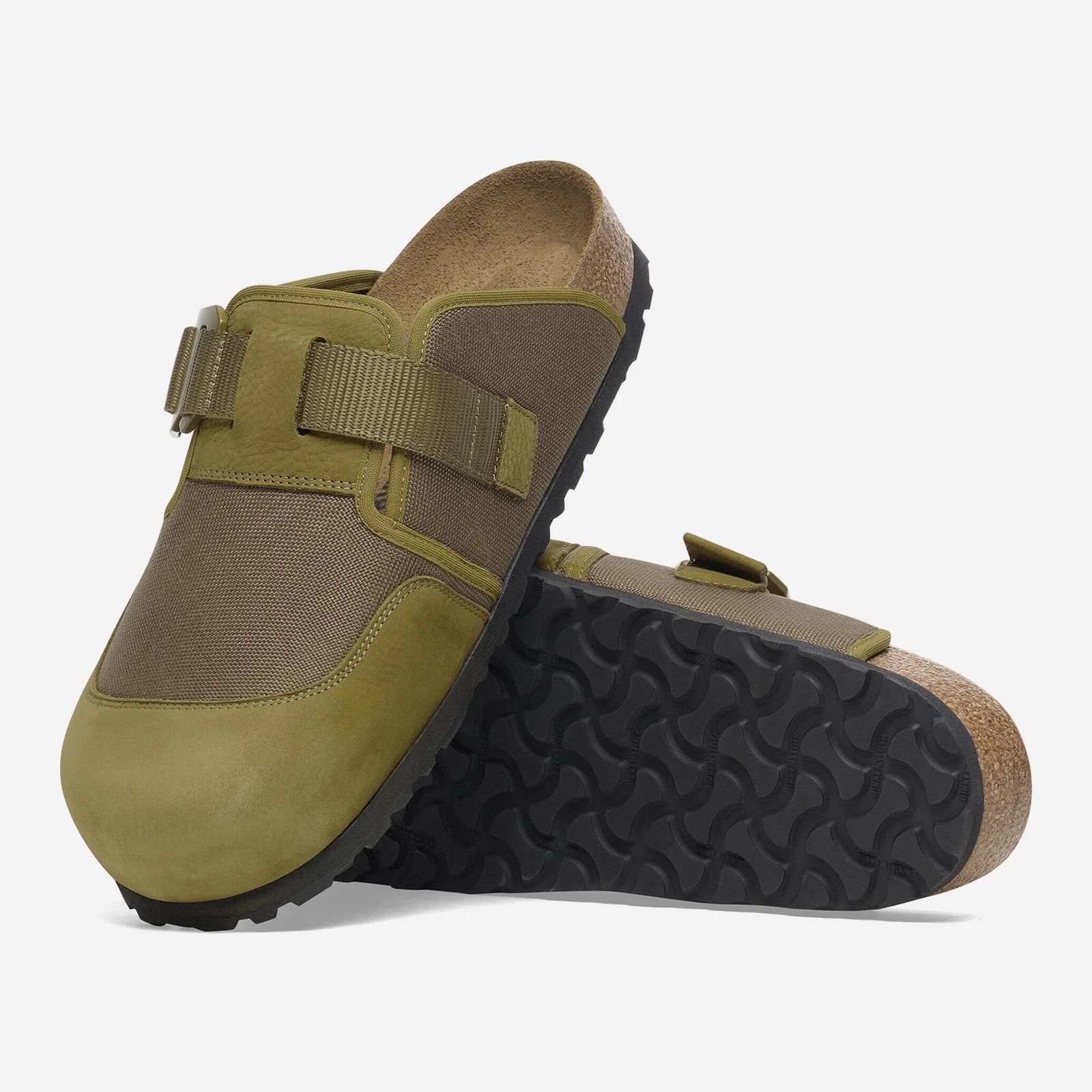 A pair of Birkenstock Boston Nova sandal in olive green shown stacked at angles against a light grey background. 