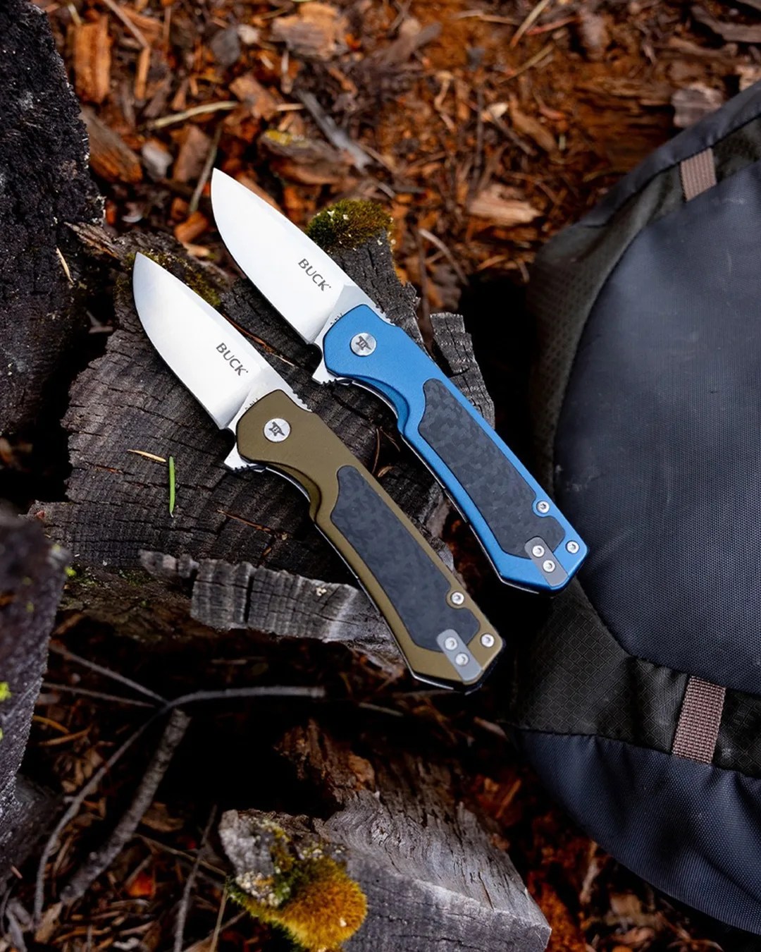 Buck Stinger knives on wood outdoors