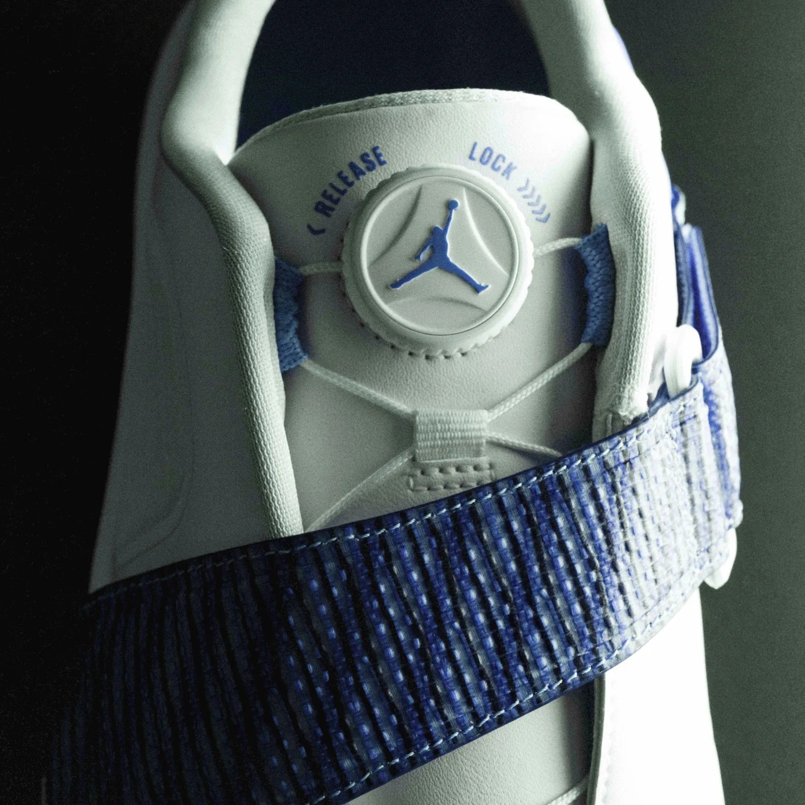 A close-up of the lacing system of the Jordan Brand Air Rev golf shoe.