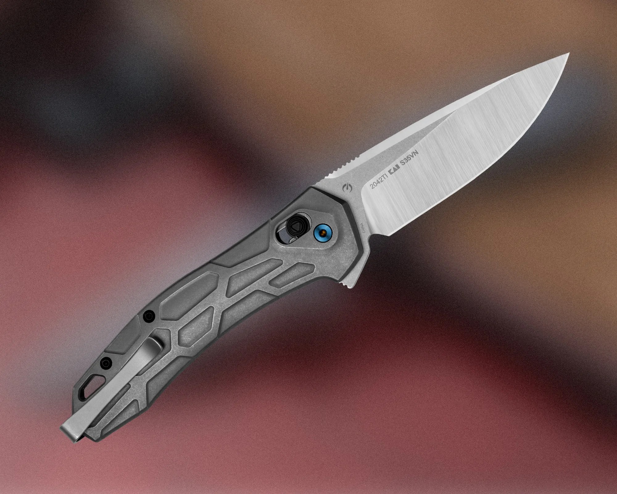 Kershaw Covalent Titanium EDC Knife on blurry background