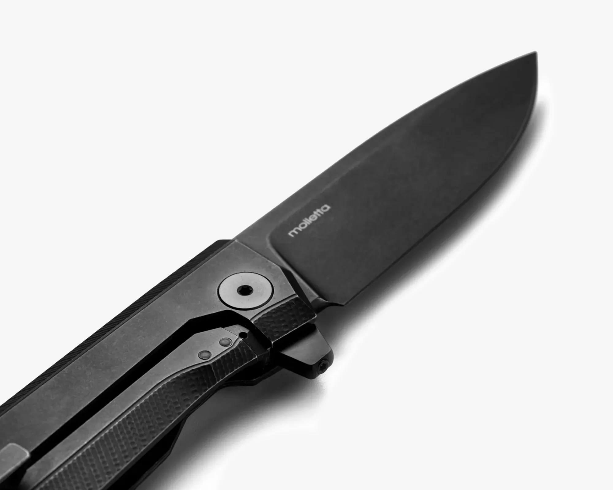 LionSteel Myto MagnaCut knife closeup on gray background