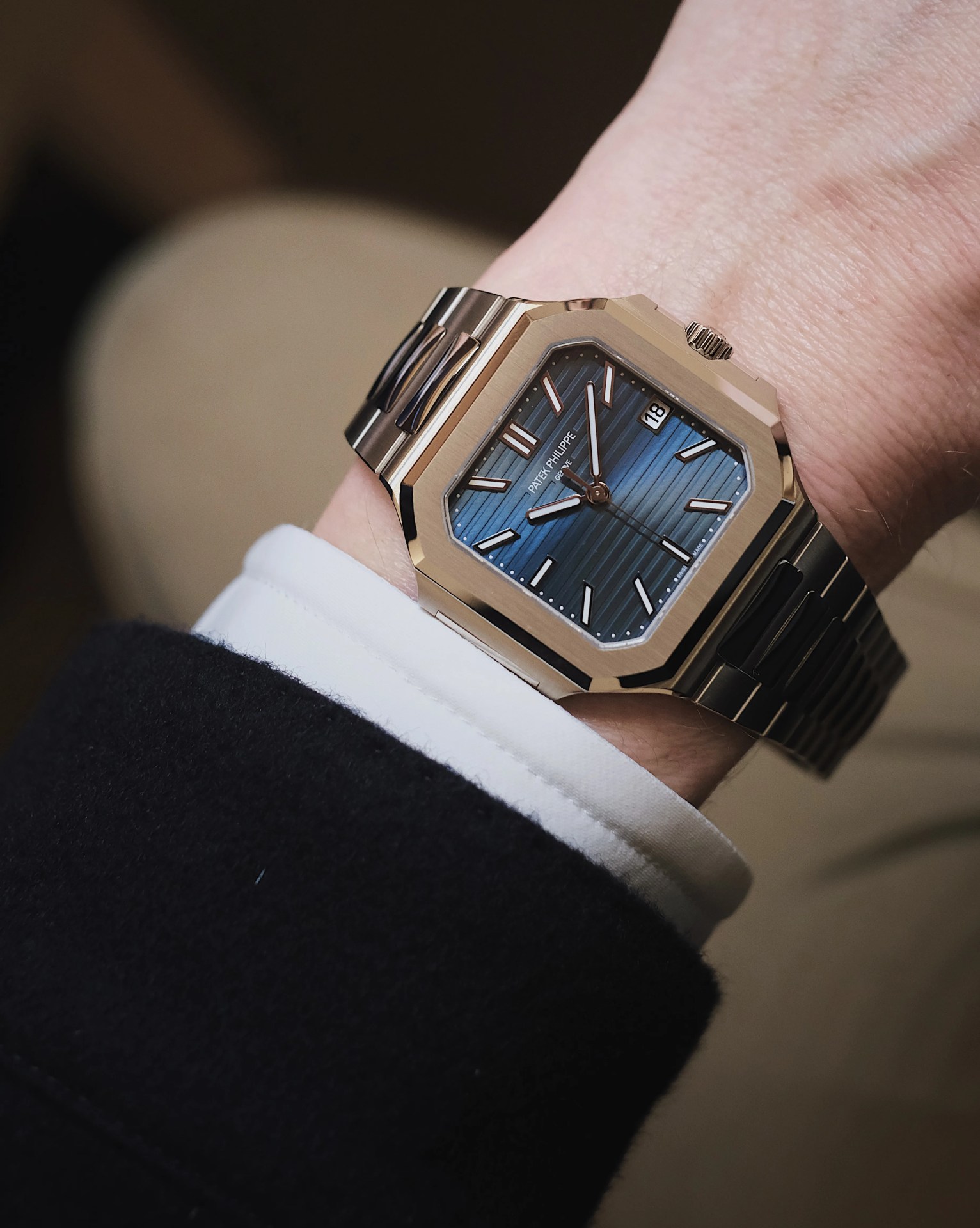 Patek Philippe Cubitus 7128 1G worn on mans wrist