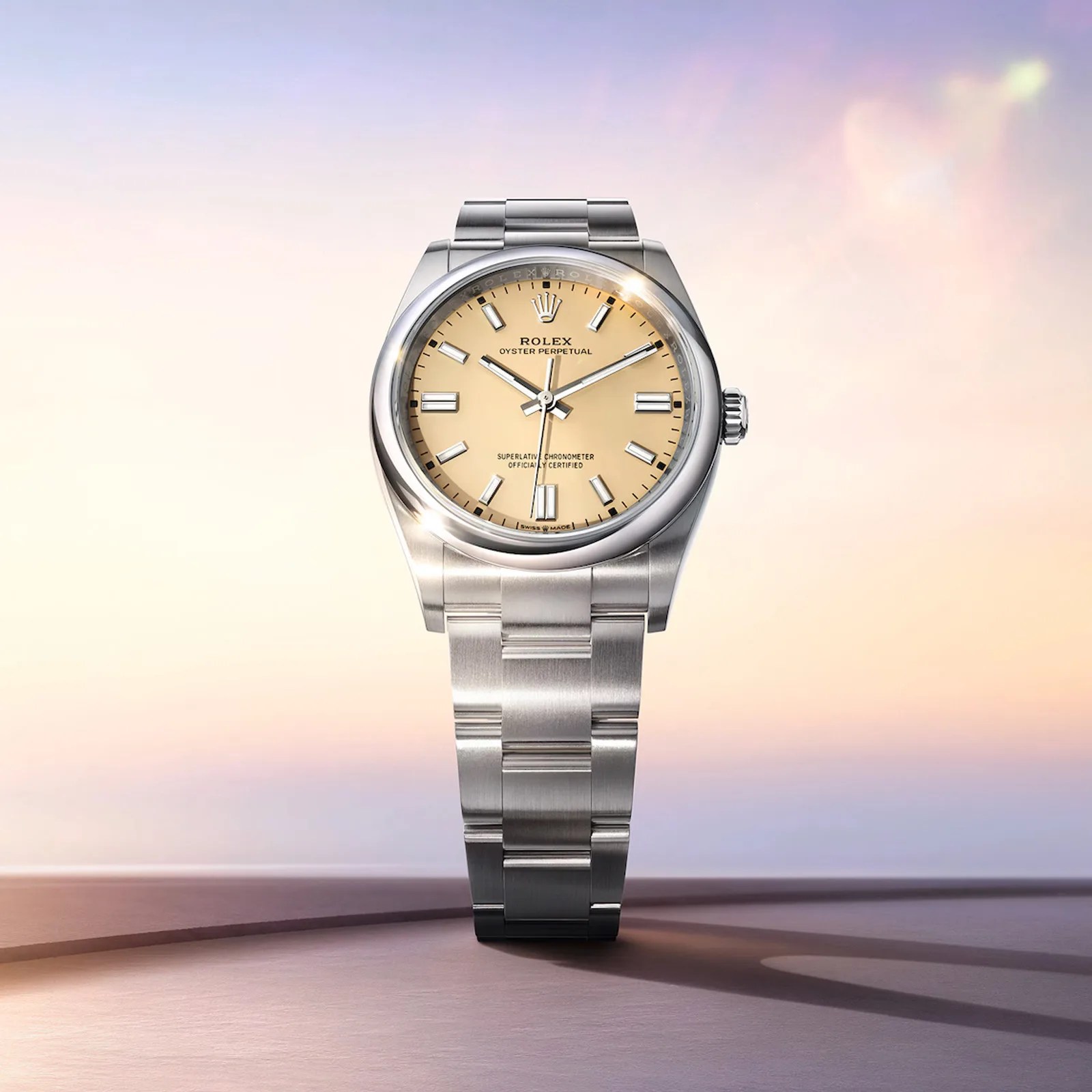 A Rolex Oyster Perpetual Watch with a Beige-colored dial.