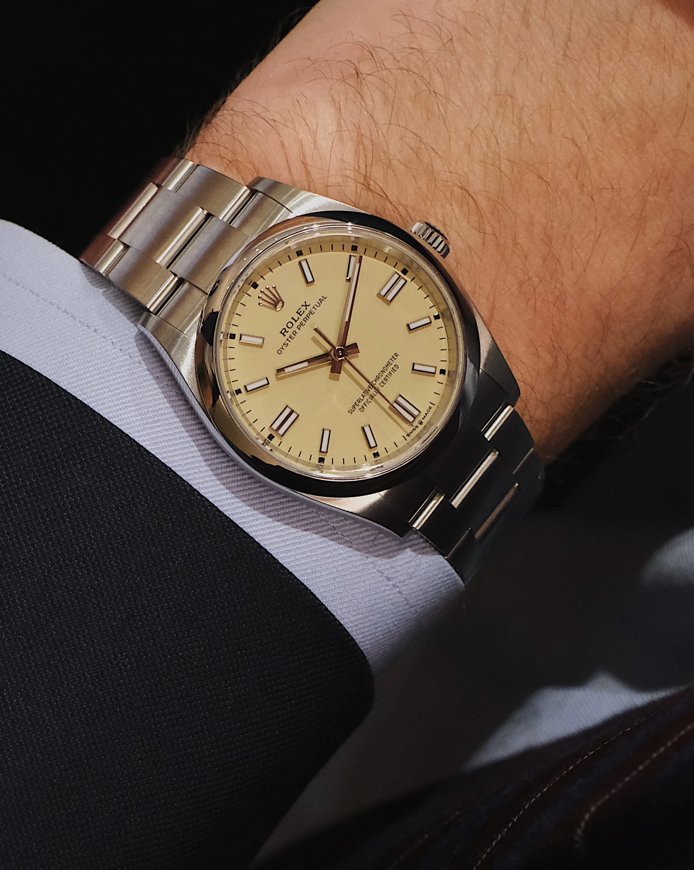 a rolex watch on a mans wrist