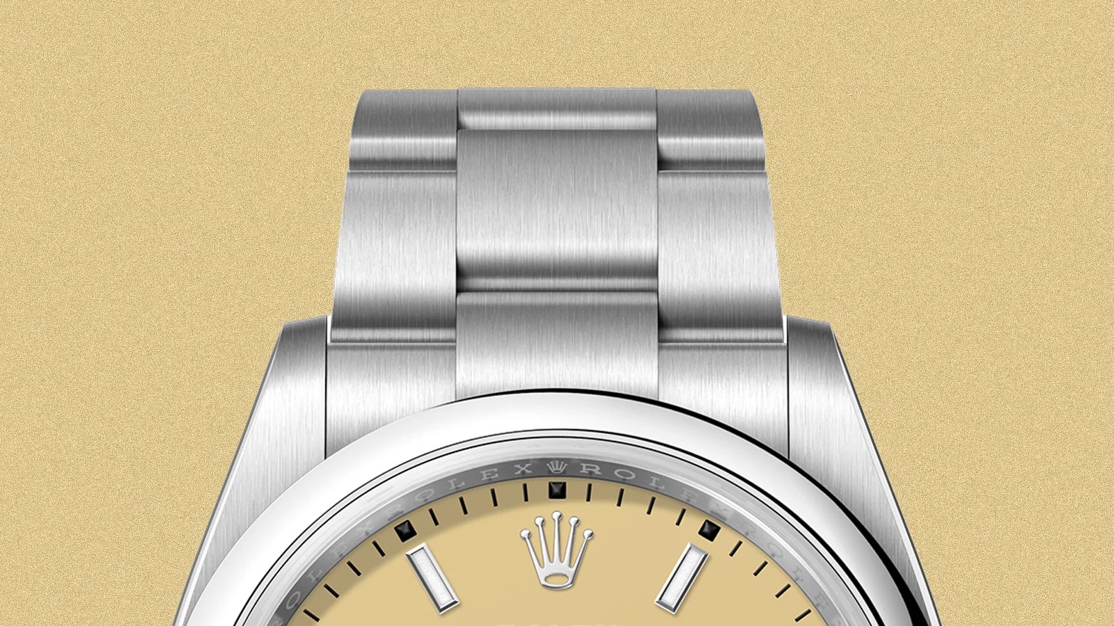 A close-up of the top portion of the dial of the Rolex Oyster Perpetual 36 released in 2025 against a light beige background.