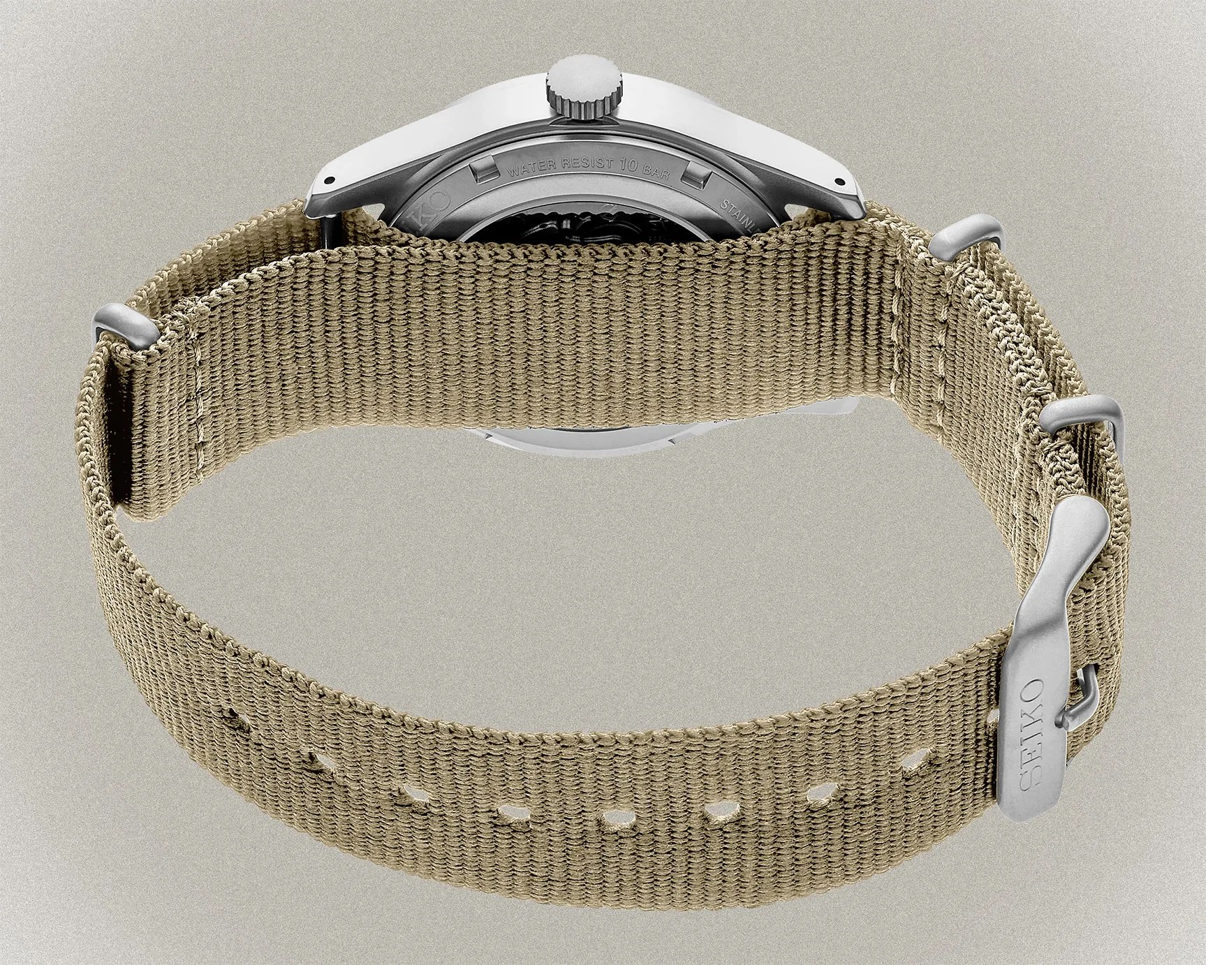 the back and nylon strap of a seiko watch