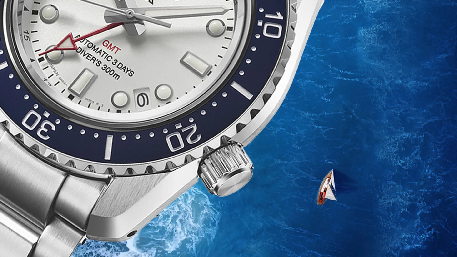 Seiko Prospex 1968 Heritage Divers GMT 60th Anniversary SPB519J1 watch closeup above ocean and sailboat