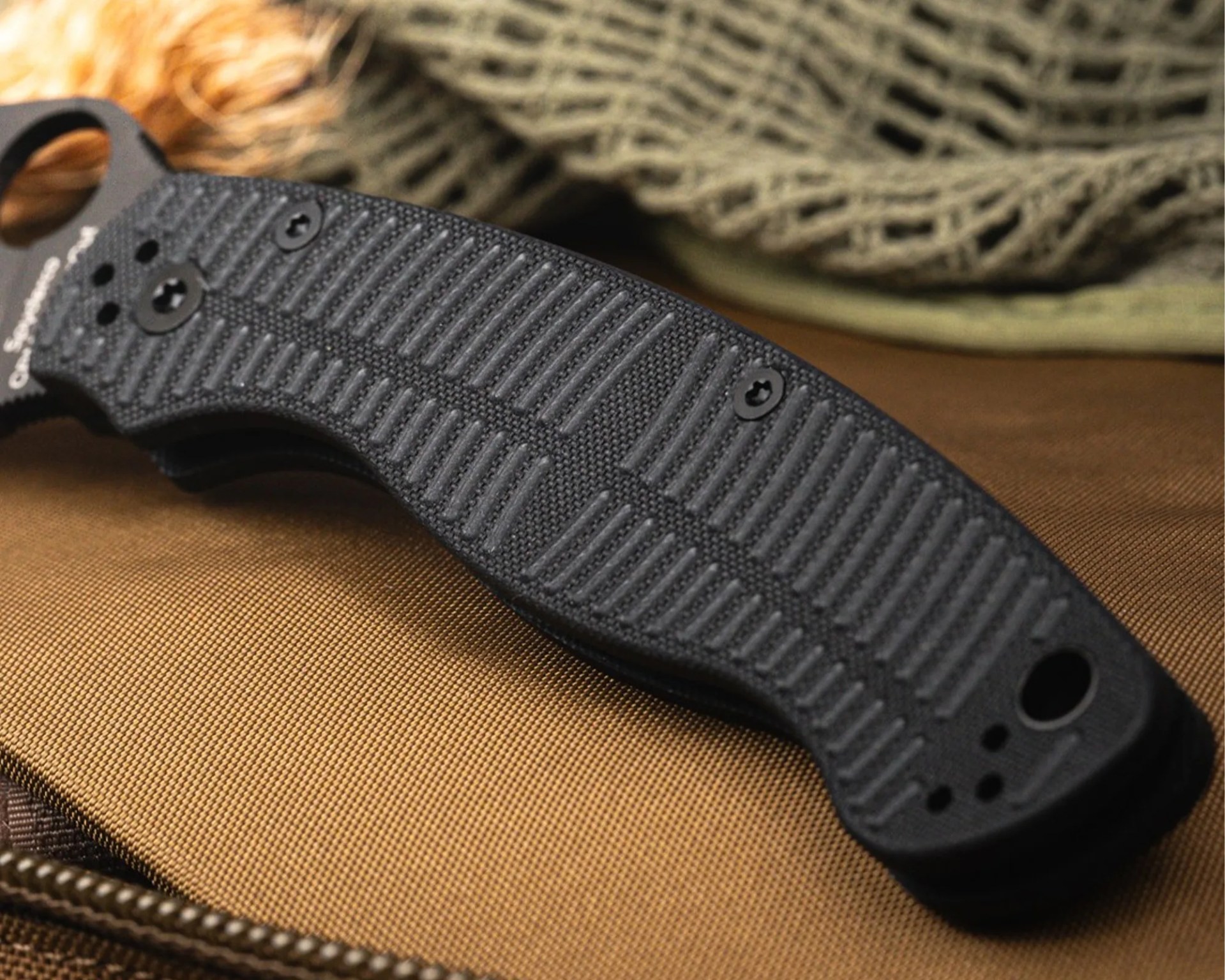 Spyderco Military 2 Salt knife handle on tactical pack