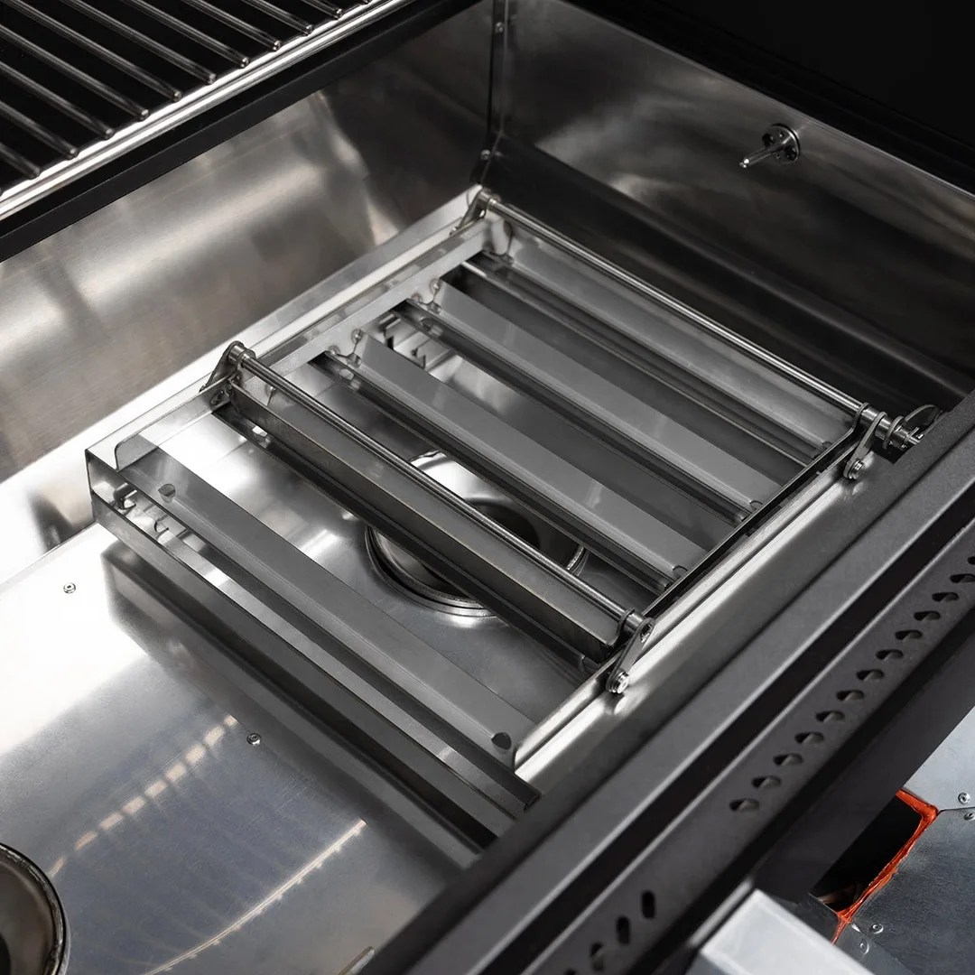 A close-up of the stainless stell under grates of the X-Fire Pro 825. 