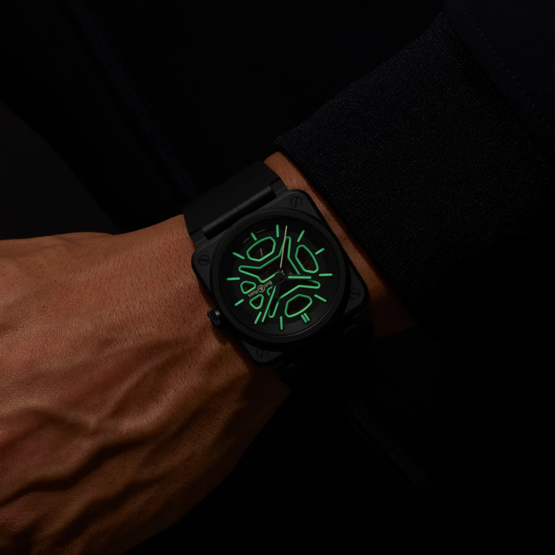 a lumed bell and ross watch on a mans wrist