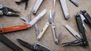 Leatherman multi-tools arranged on concrete