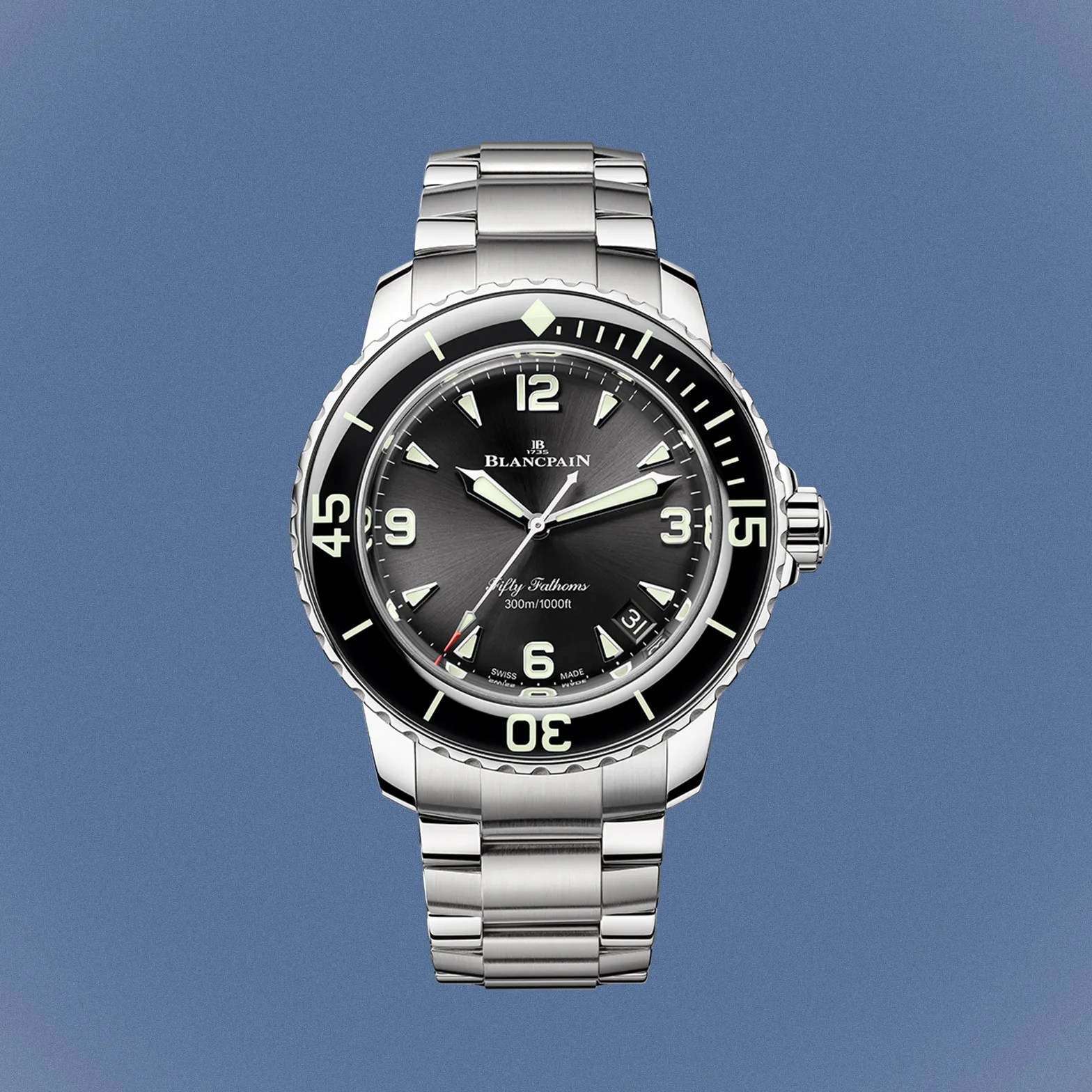 a Blancpain dive watch with a black dial and steel bracelet