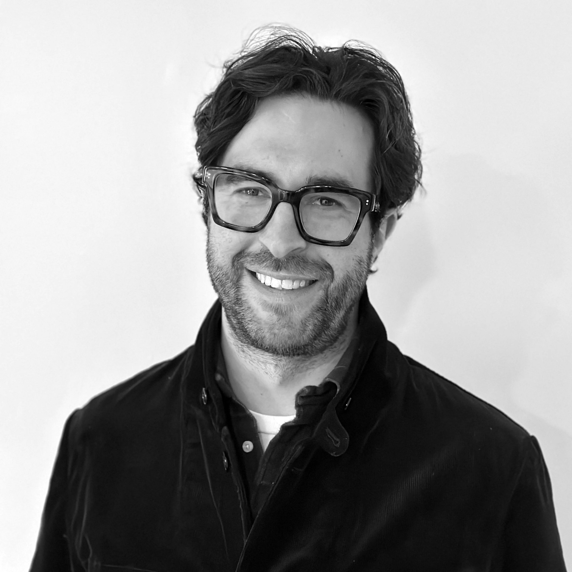 black and white headshot of brad lanphear