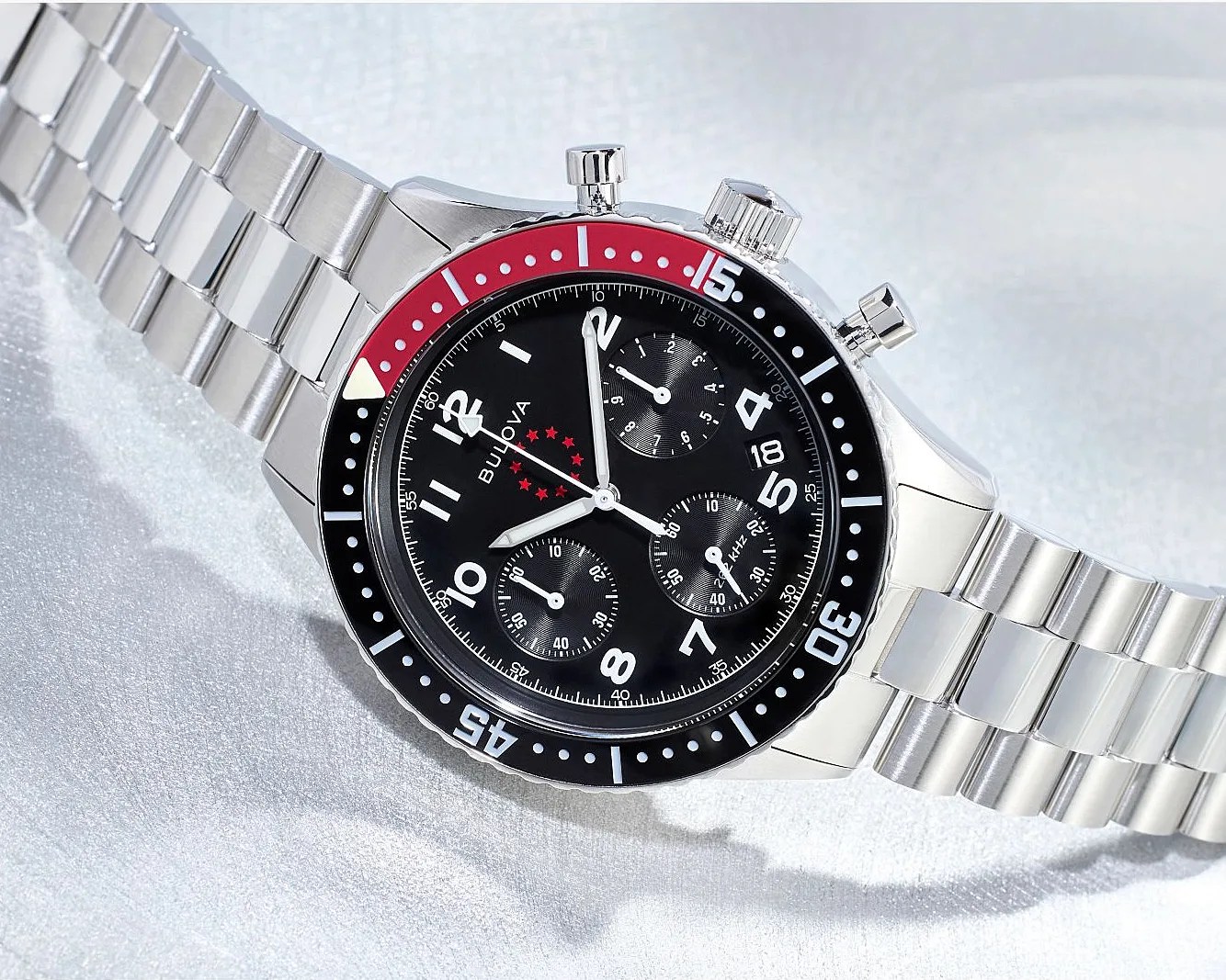 a Bulova chronograph with a black dial and steel bracelet