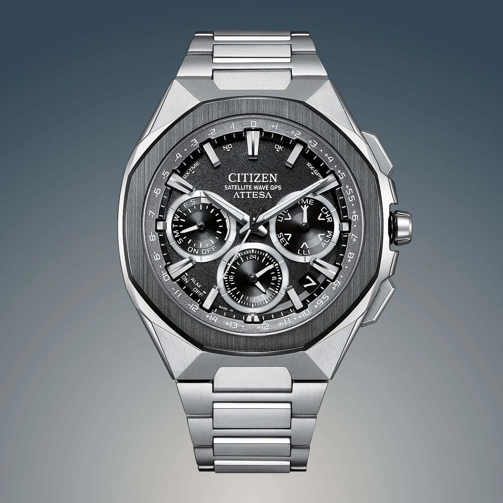 A titanium chronograph watch with a black dial