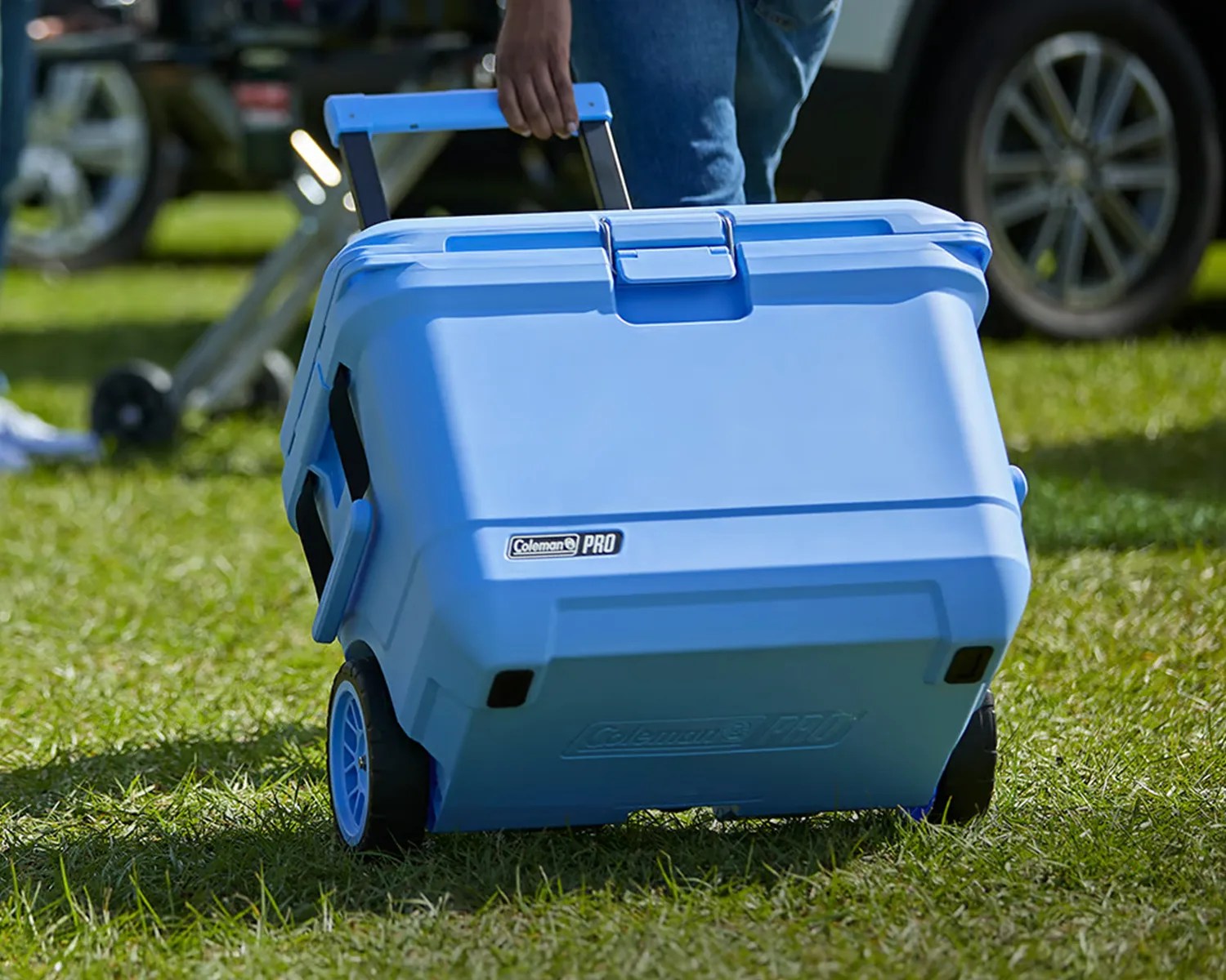 coleman pro 55 quart wheeled hard cooler grass