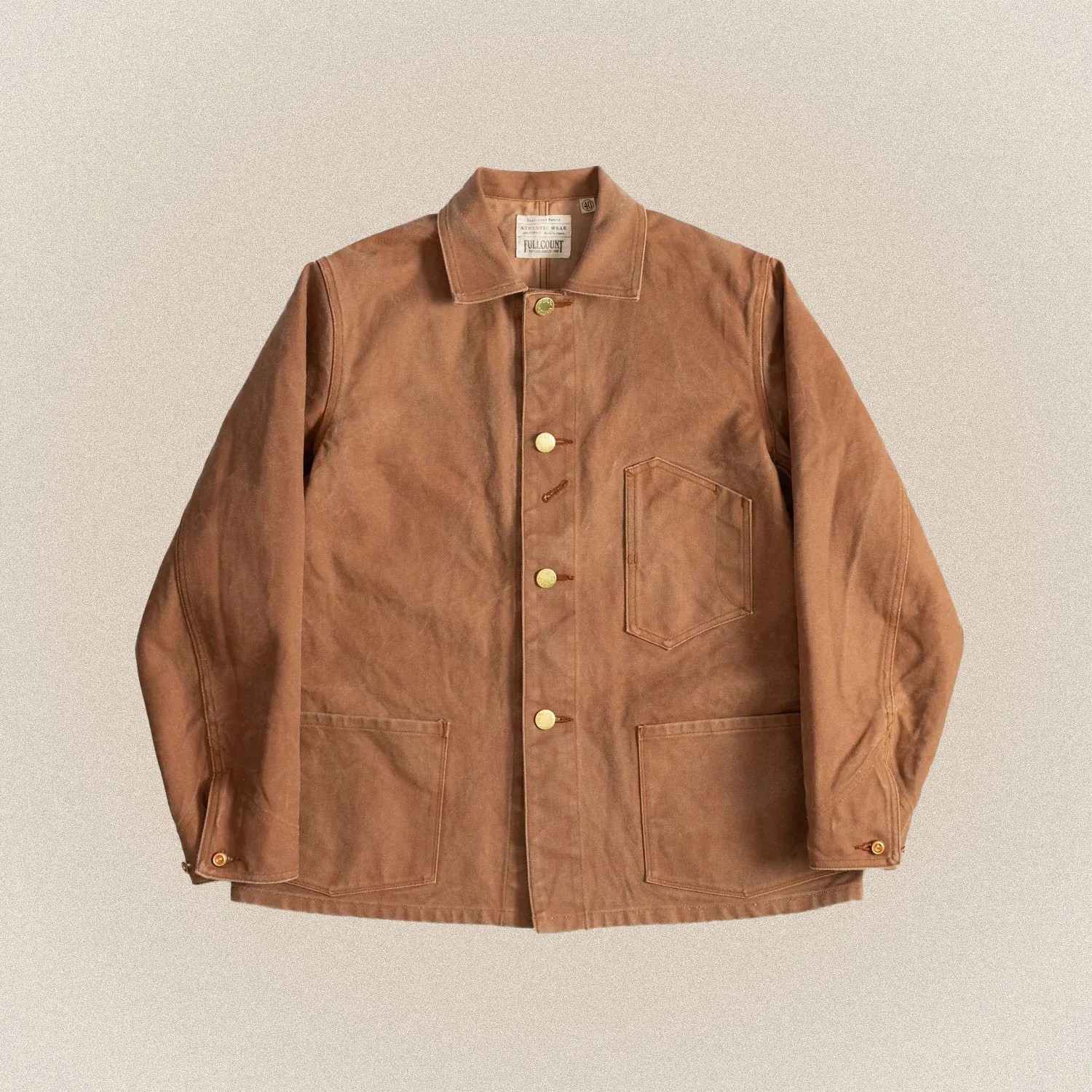 a brown canvas chore coat