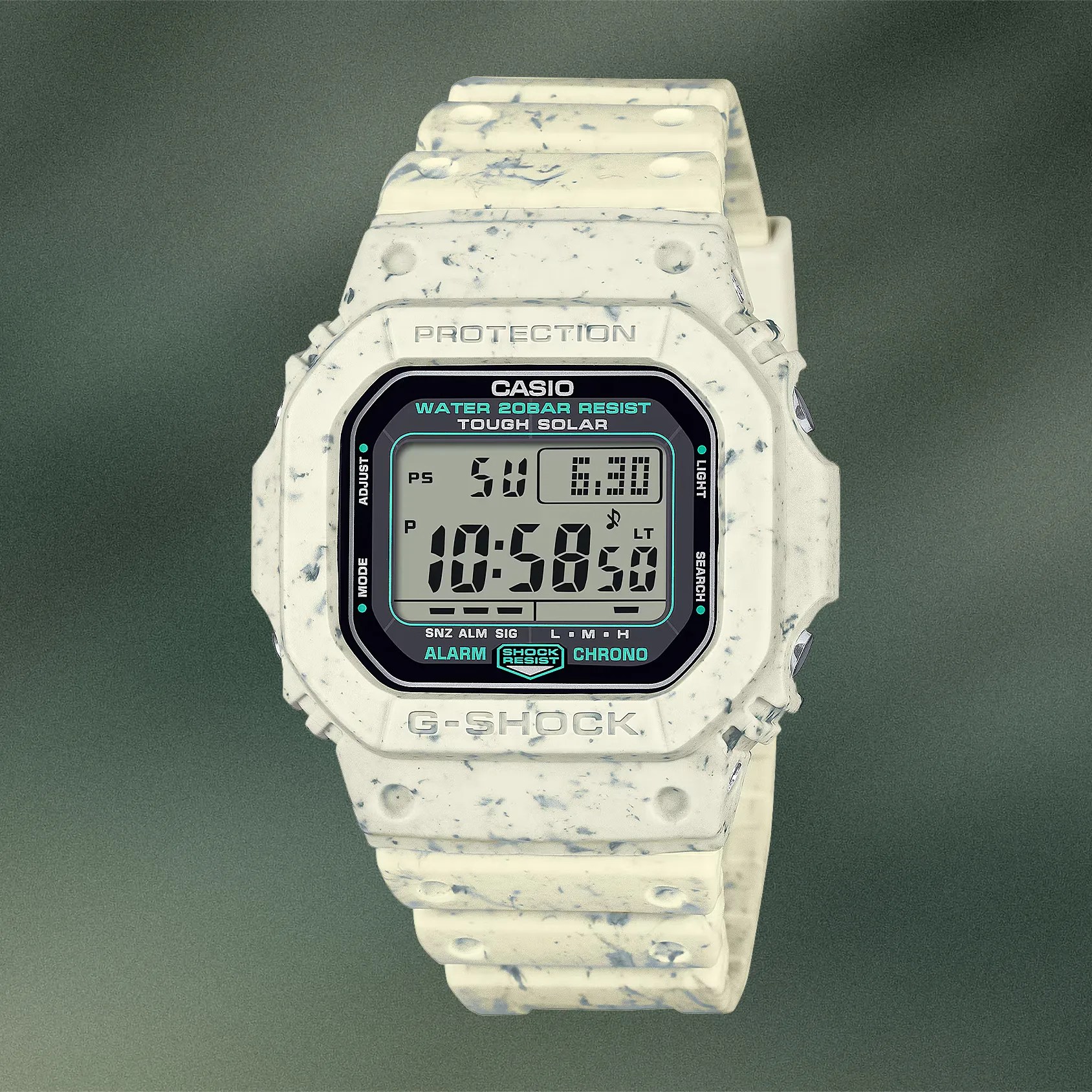 a white casio digital watch