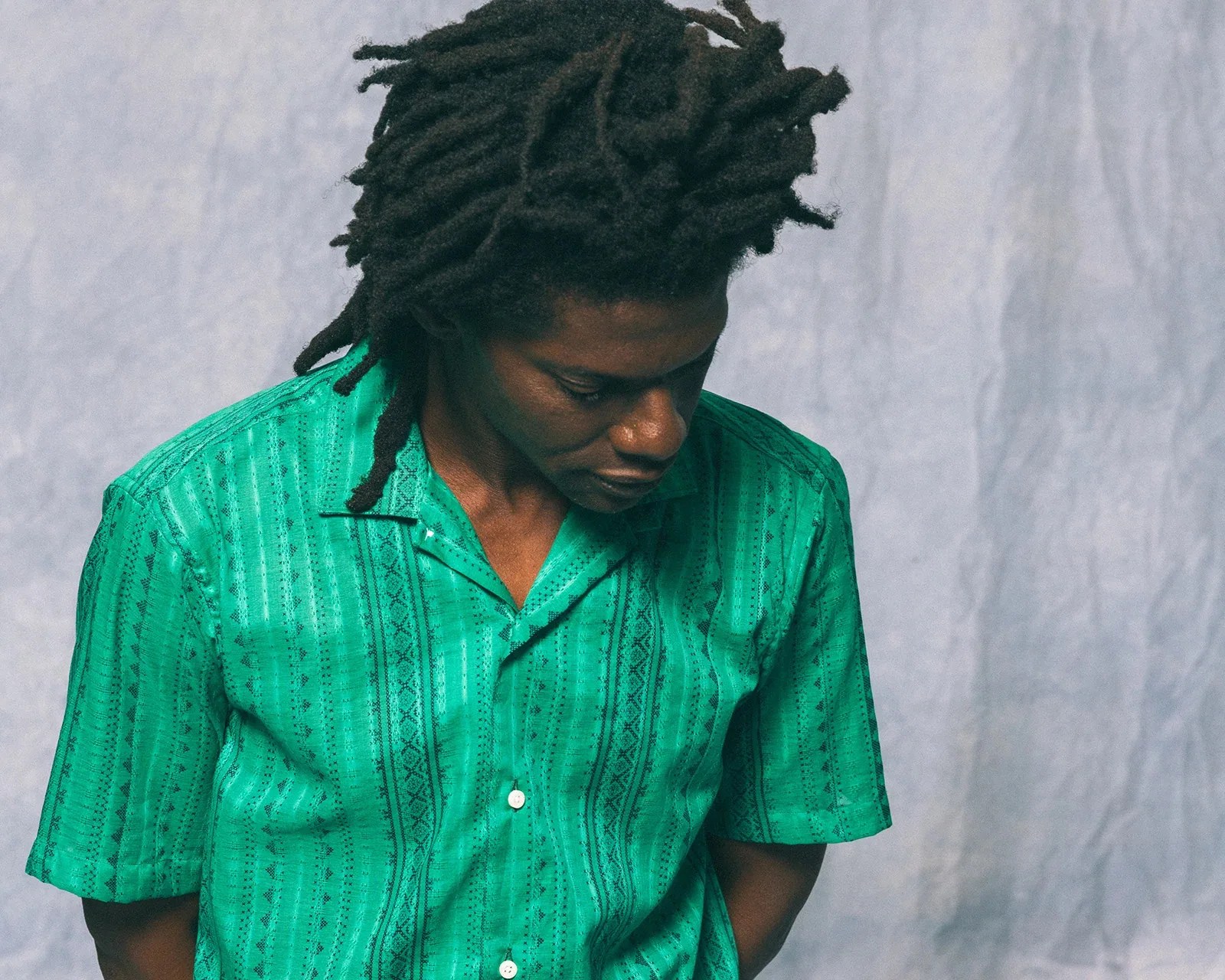 a man in a green shirt